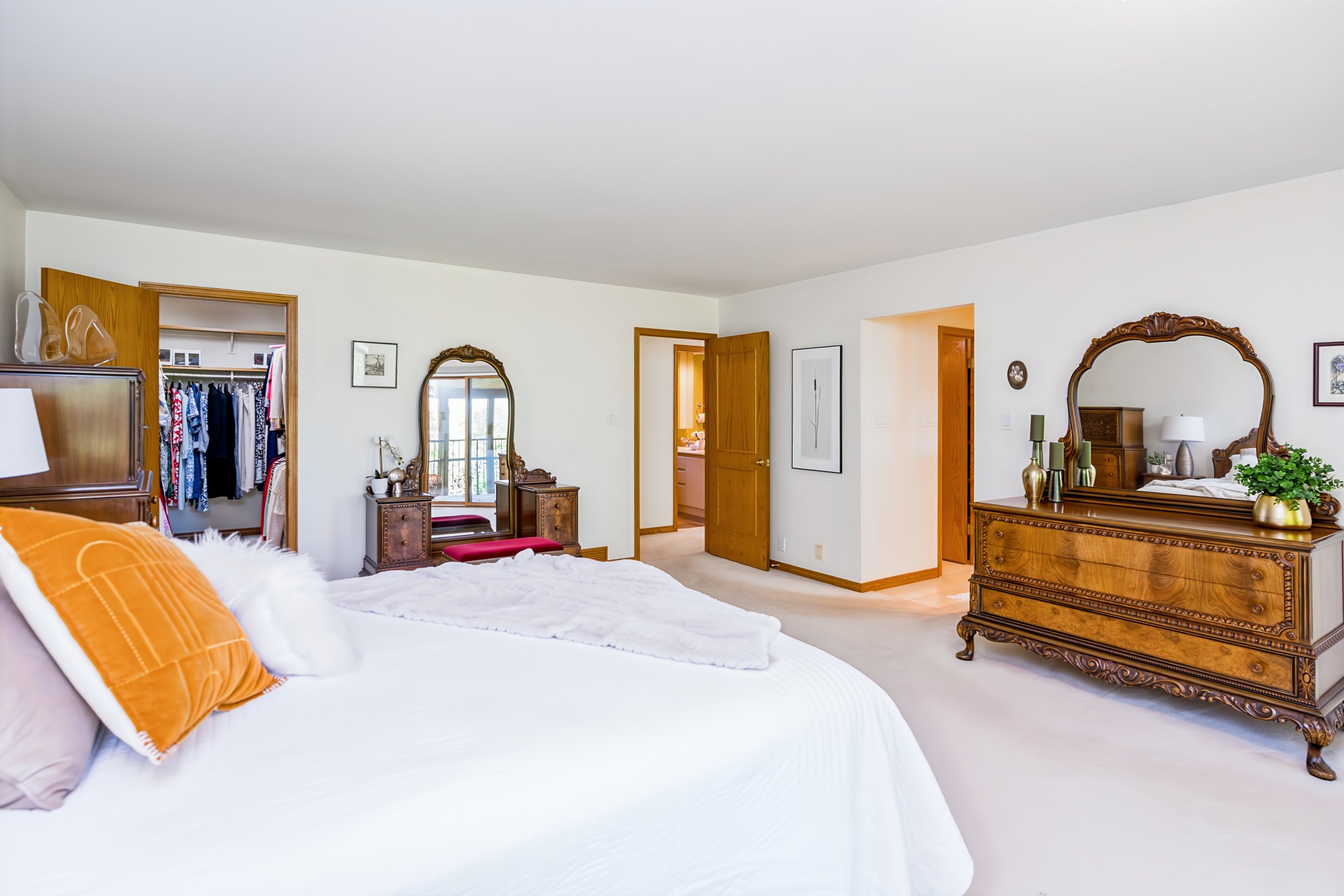 054 Expansive primary suite with peaceful riverfront views.jpg