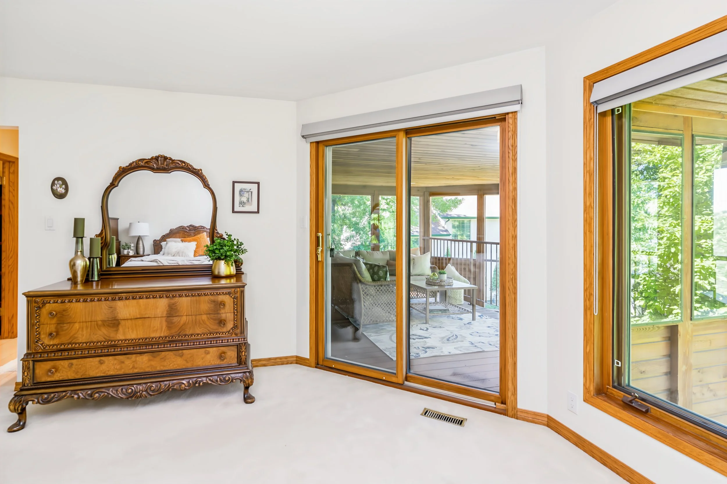 055 rimary bedroom overlooking mature backyard and river.jpg