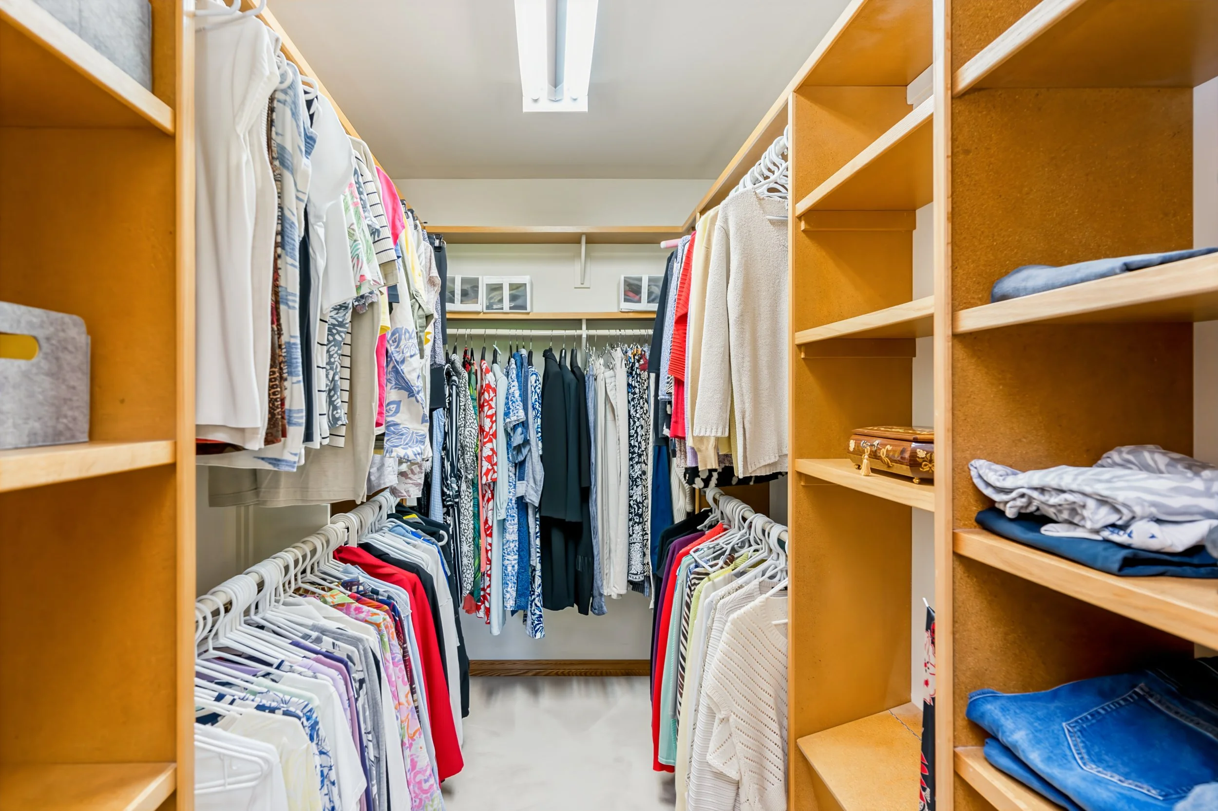 059 Primary bedroom with deep walk-in closet.jpg