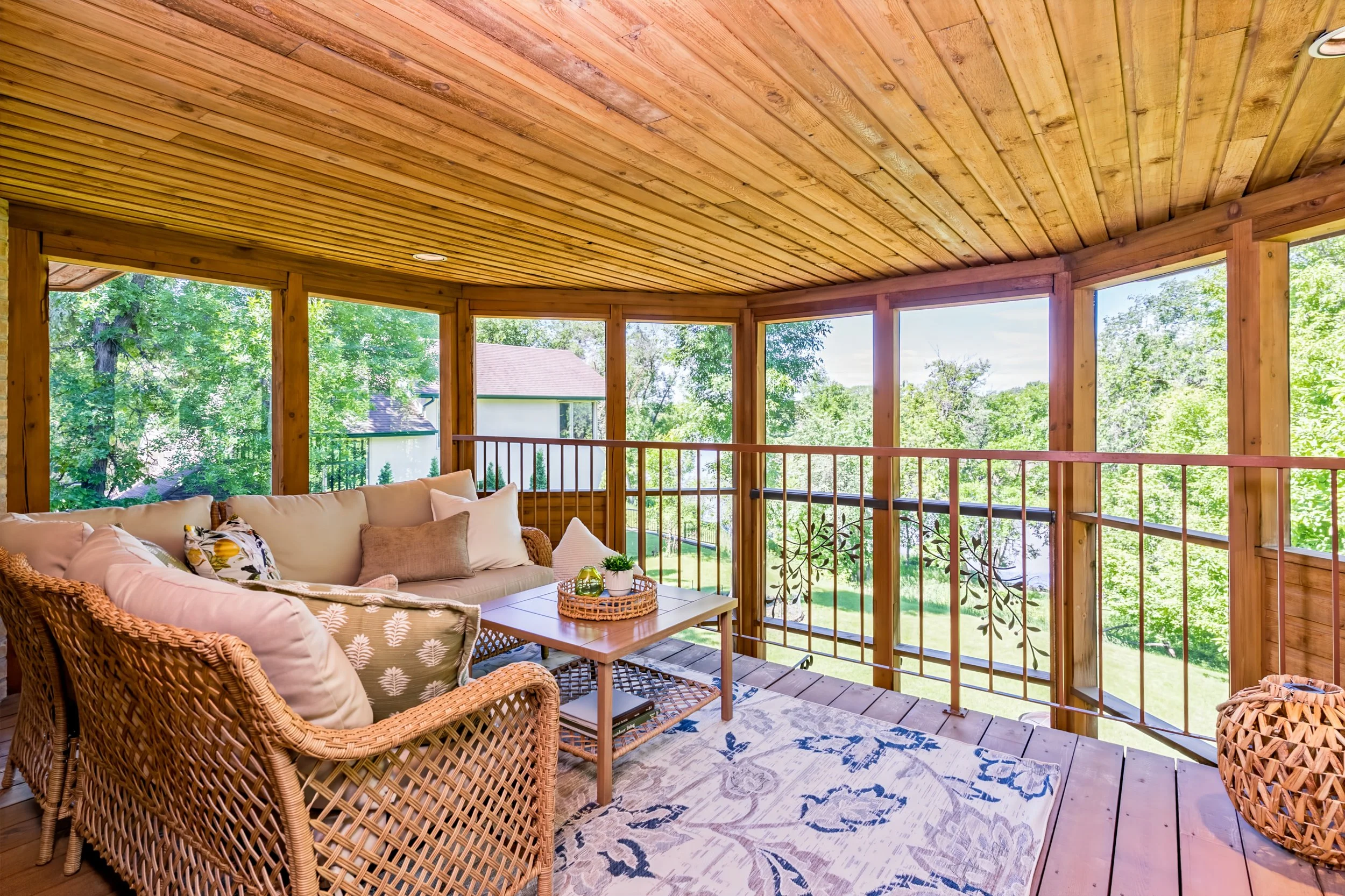060 Upper-level screened sunroom retreat off the primary suite.jpg