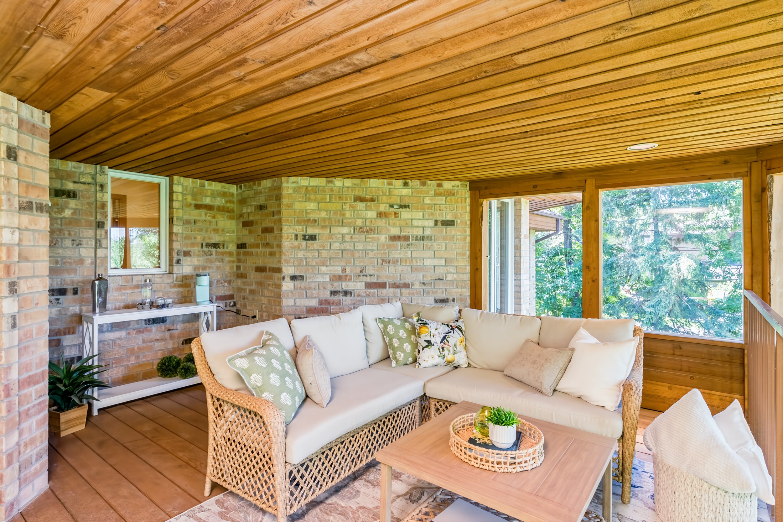 061 Second-storey sunroom with views toward the backyard.jpg