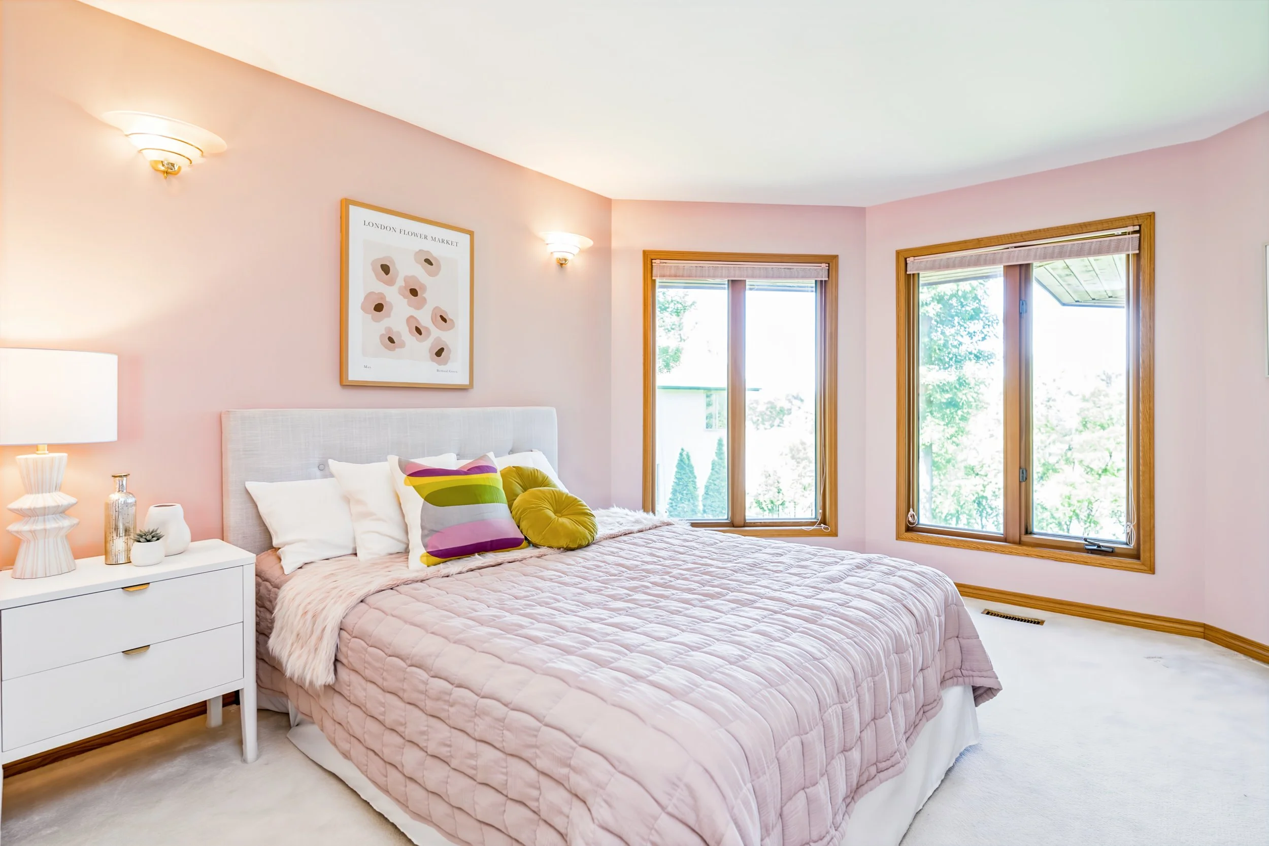 063 Spacious upper-level bedroom with room for larger furniture.jpg