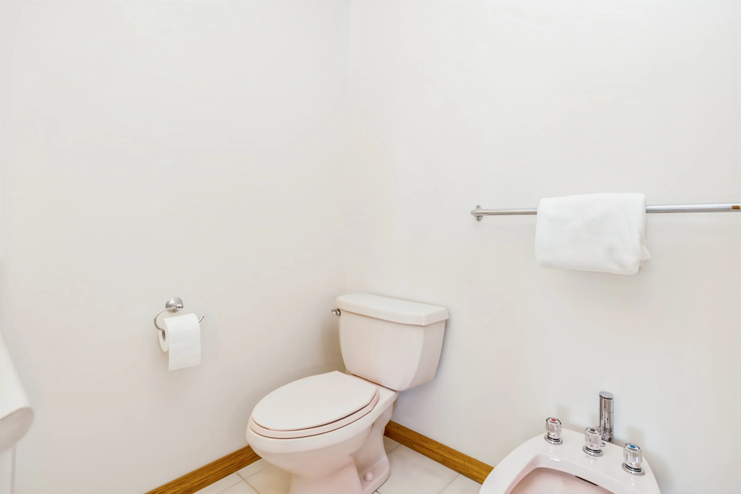 067 Upper-level bedroom with private ensuite bathroom.jpg