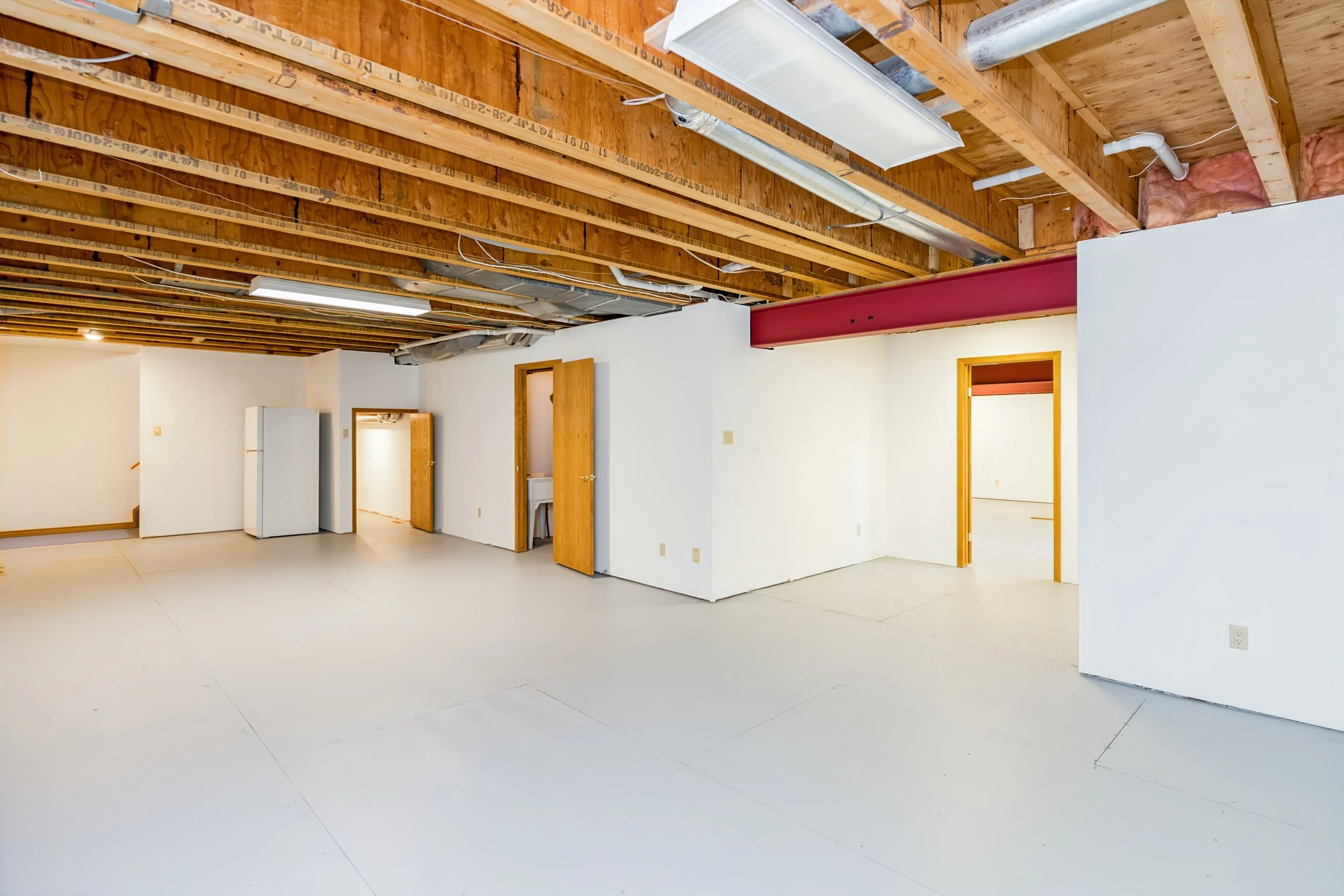 075 Basement with commercial-grade steel beam construction Winnipeg.jpg