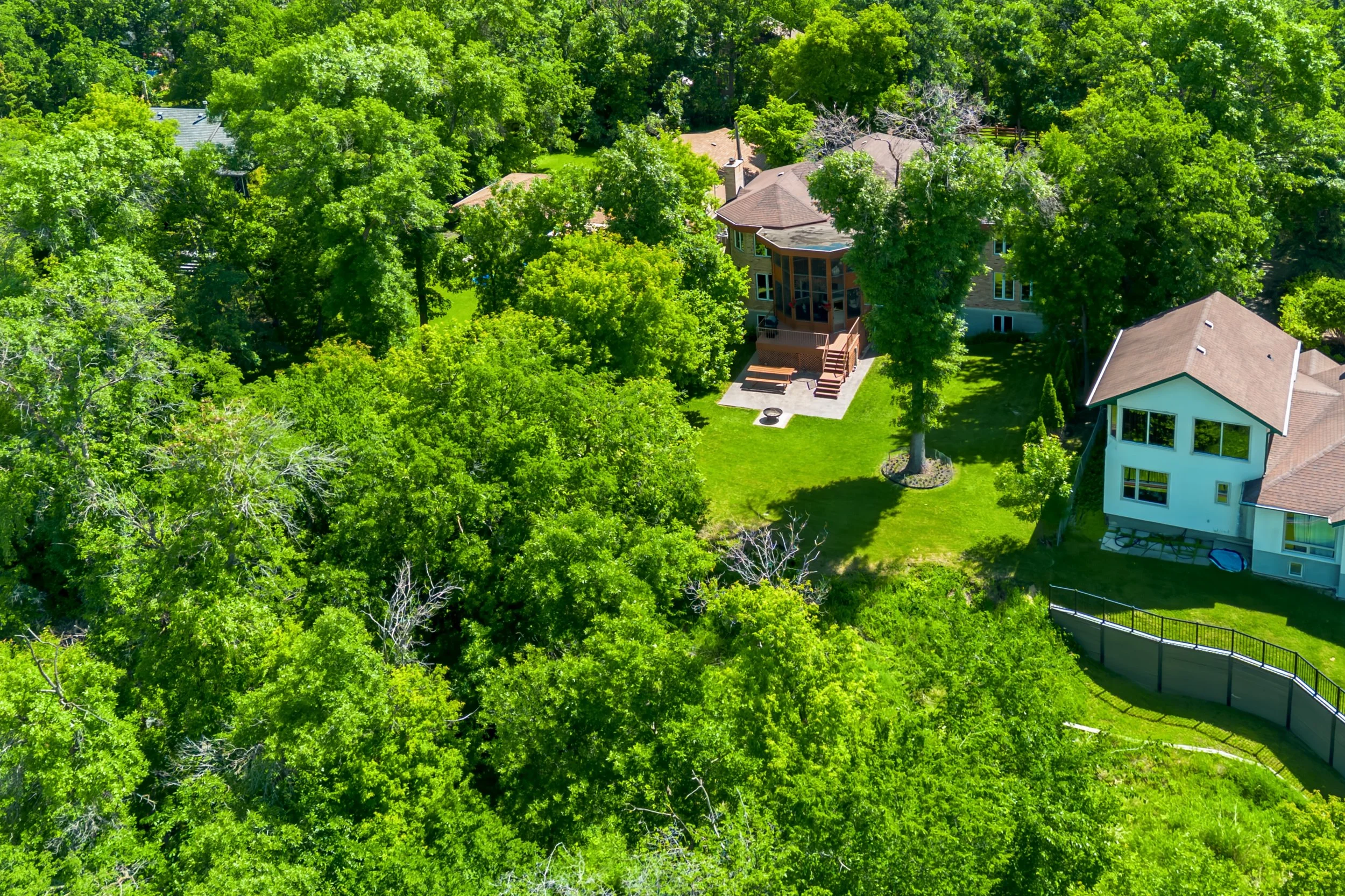 099 Custom home near St. Vital Park with prestigious riverfront setting.jpg