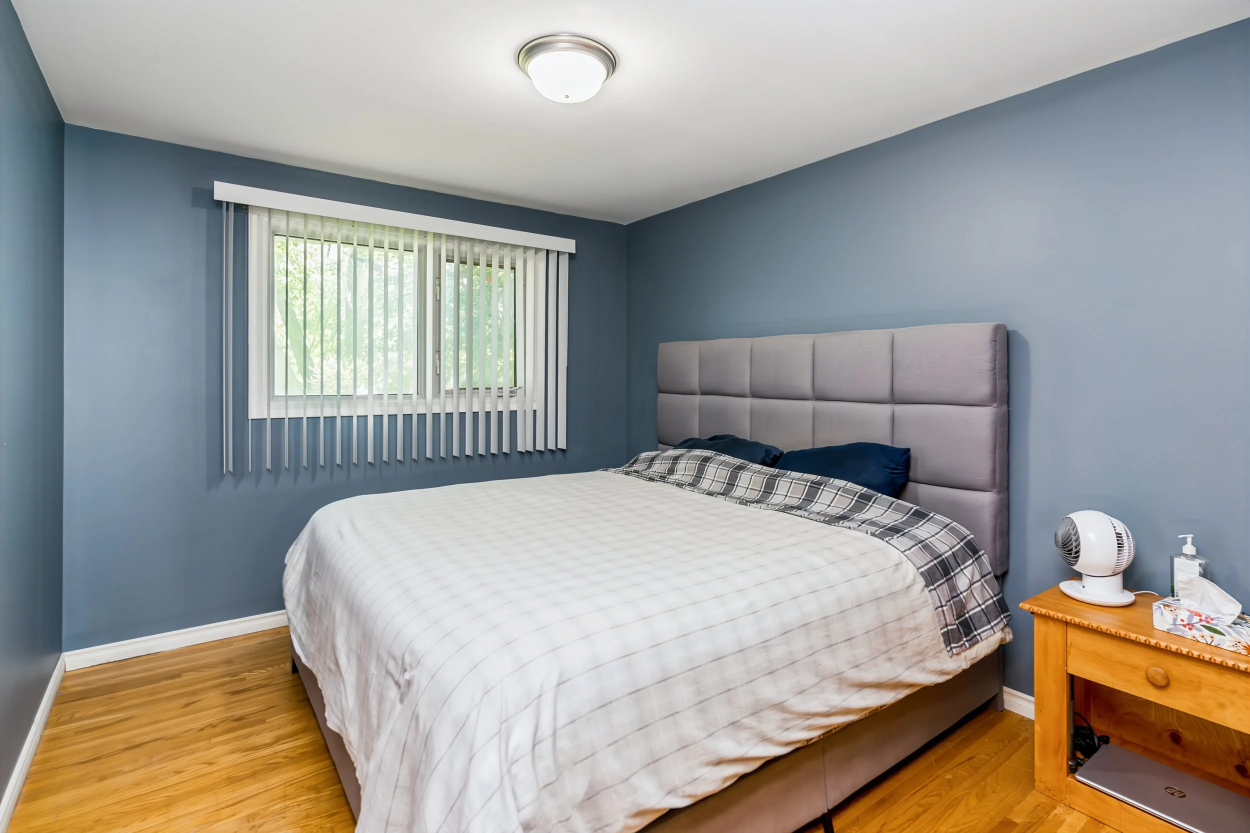 018 Primary bedroom in Windsor Park bungalow.jpg