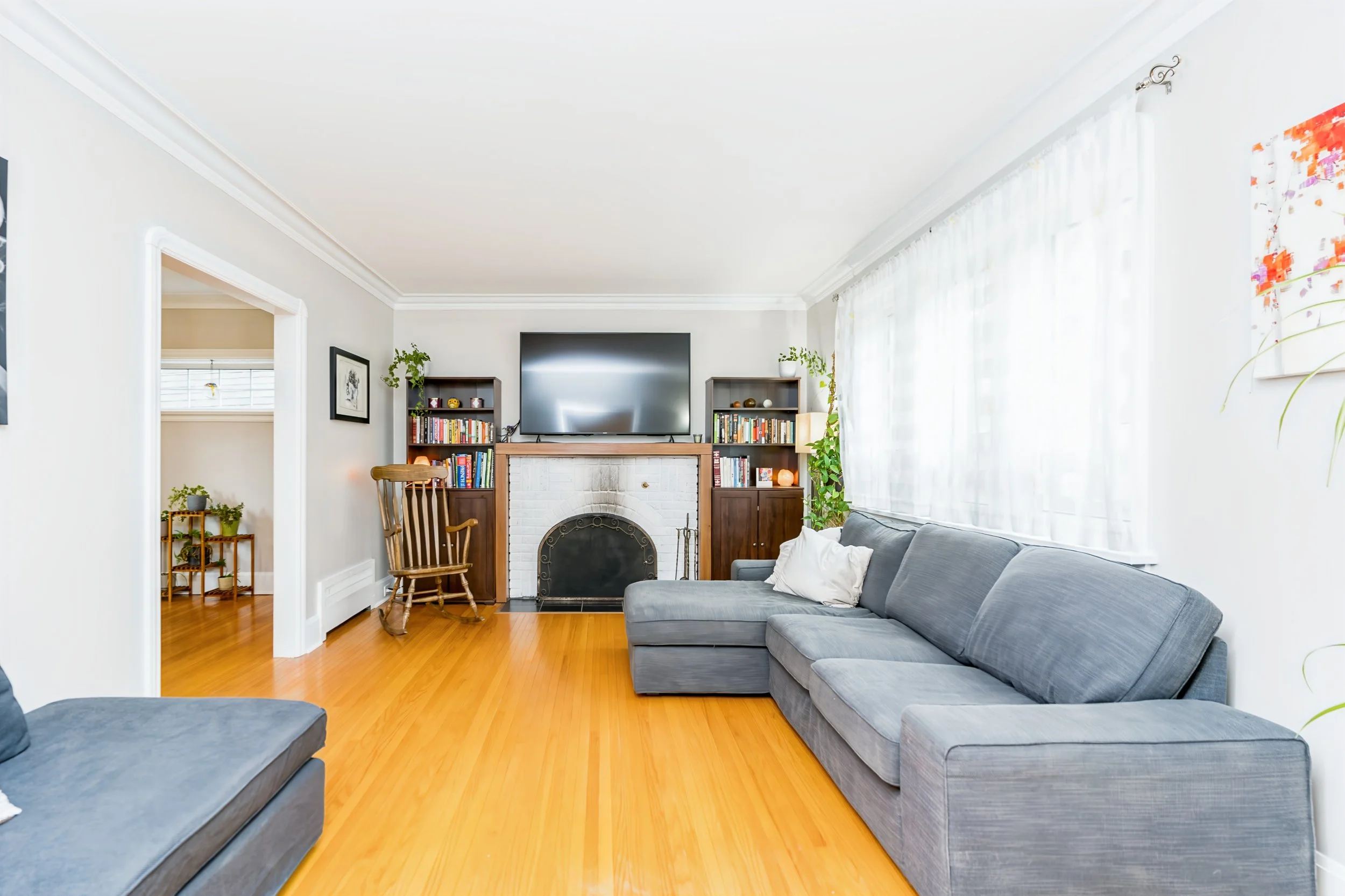 005 Character living room with large front window.jpg