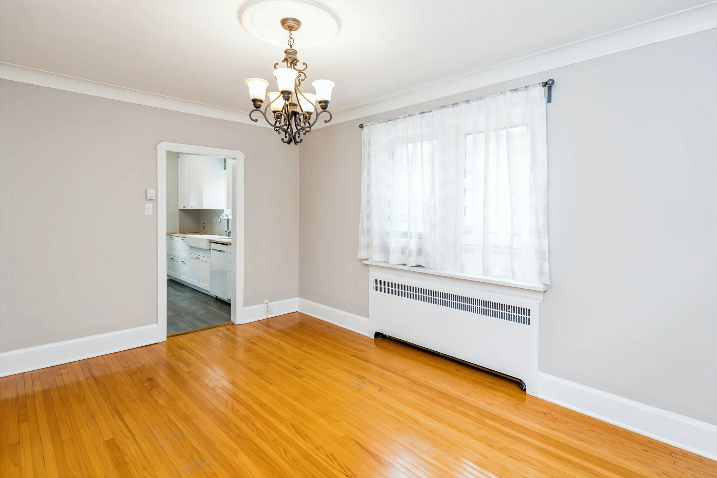 012 Dining room with piano windows and backyard views.jpg