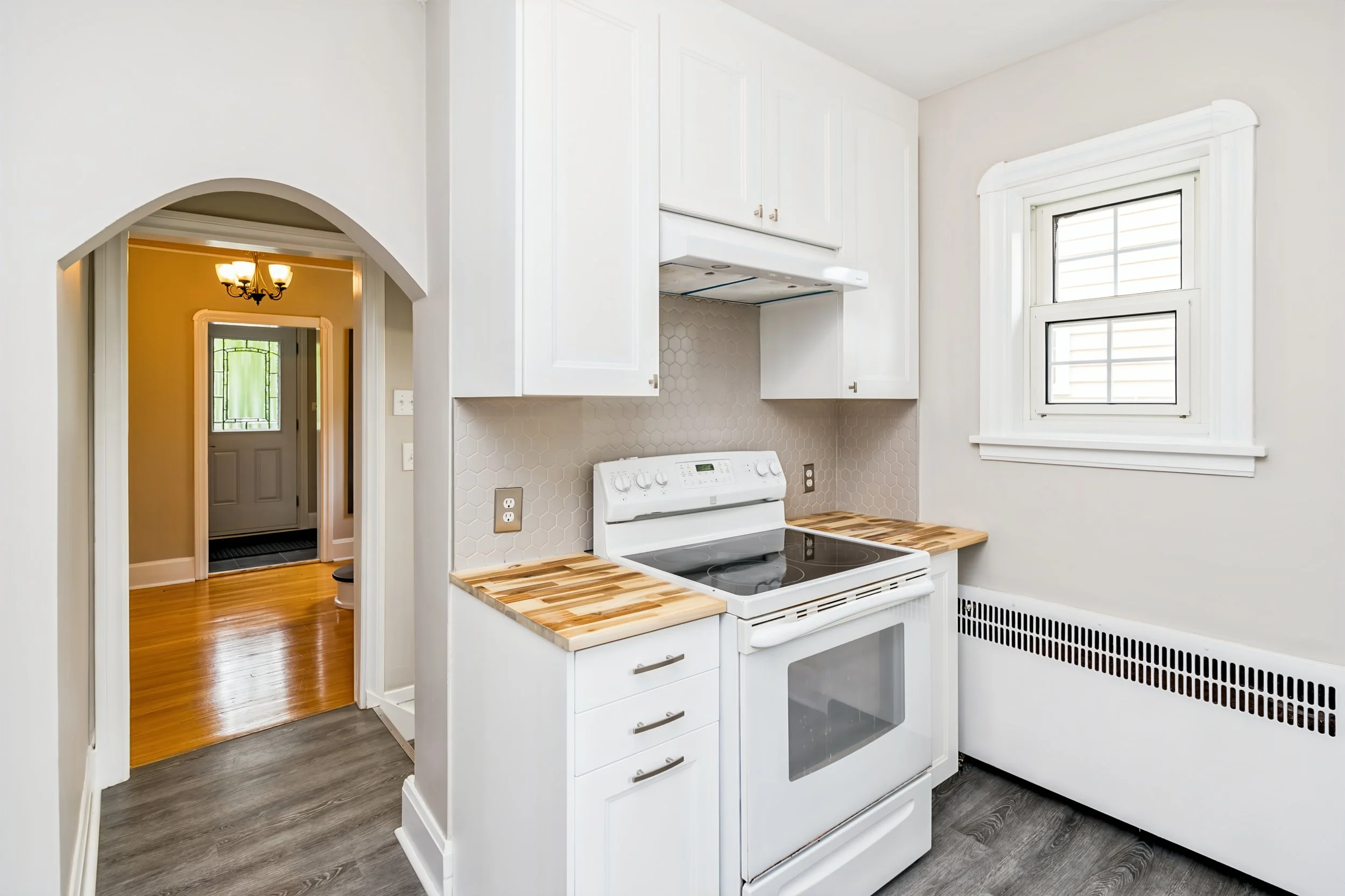 023 Farmhouse sink in updated East Fort Garry kitchen.jpg