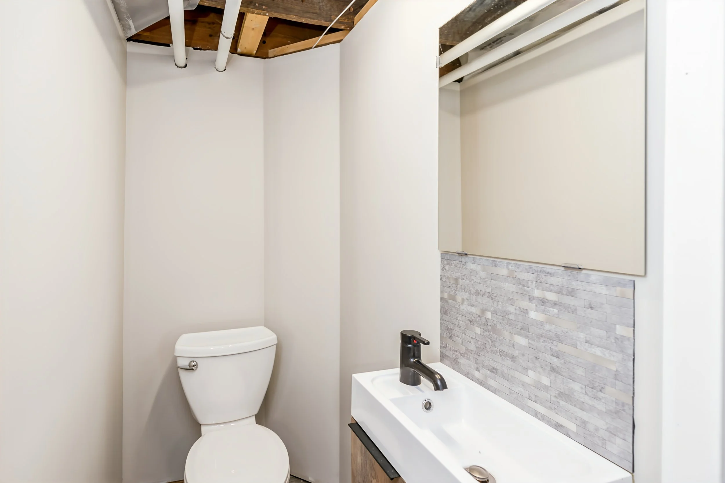 052 Basement powder room for added convenience.jpg
