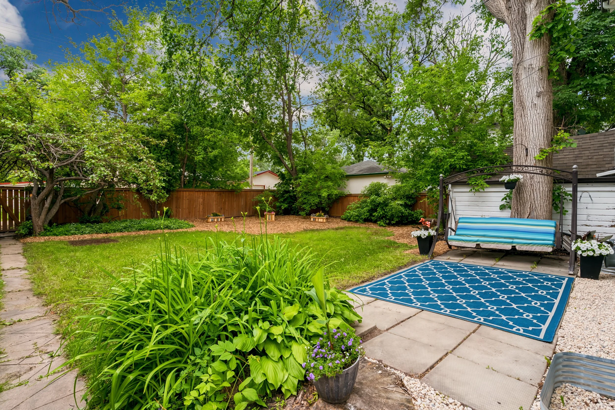 059 Rear exterior view of 658 Riverwood Avenue.jpg