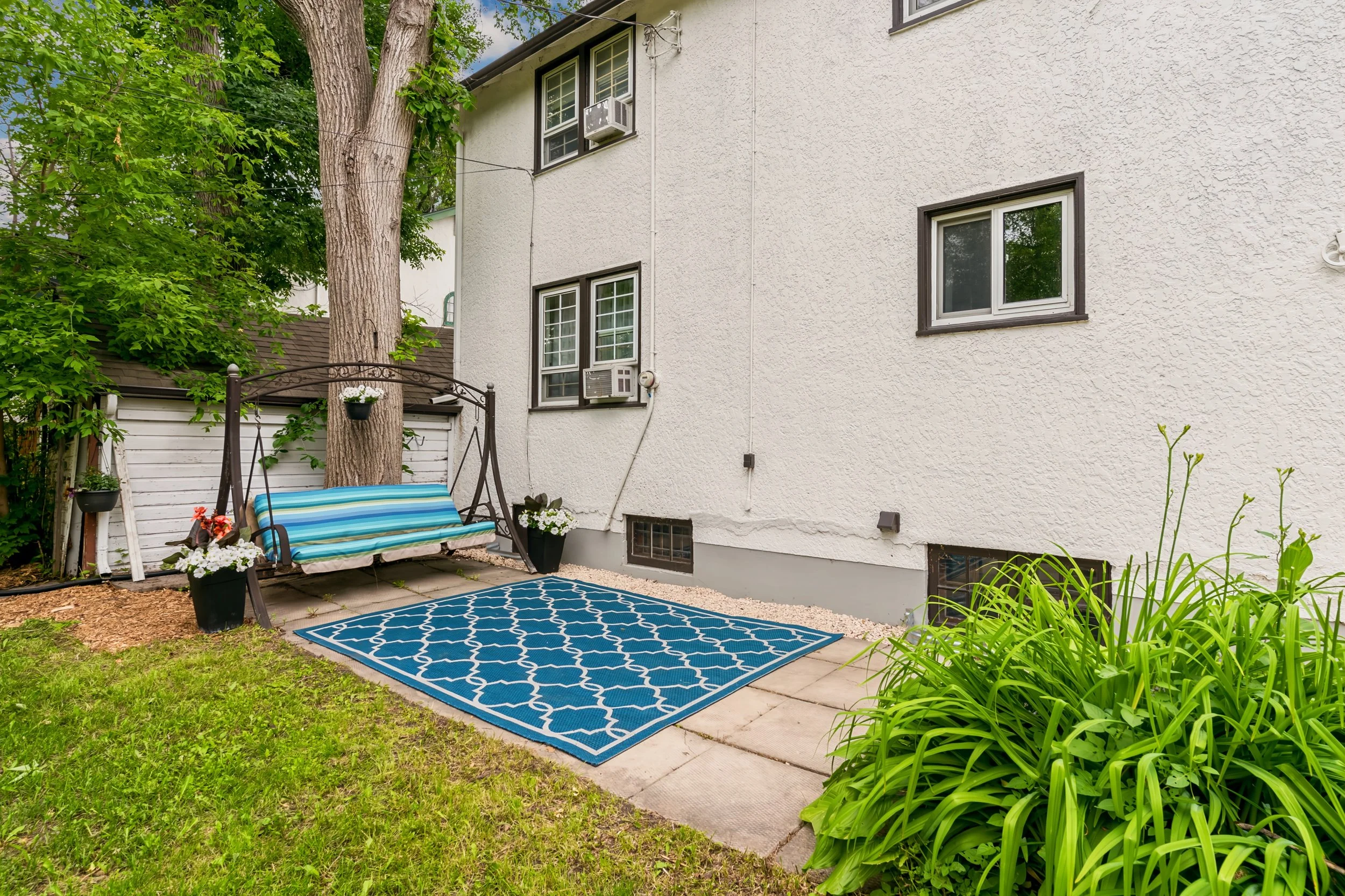 060 Backyard view of classic two-storey home.jpg