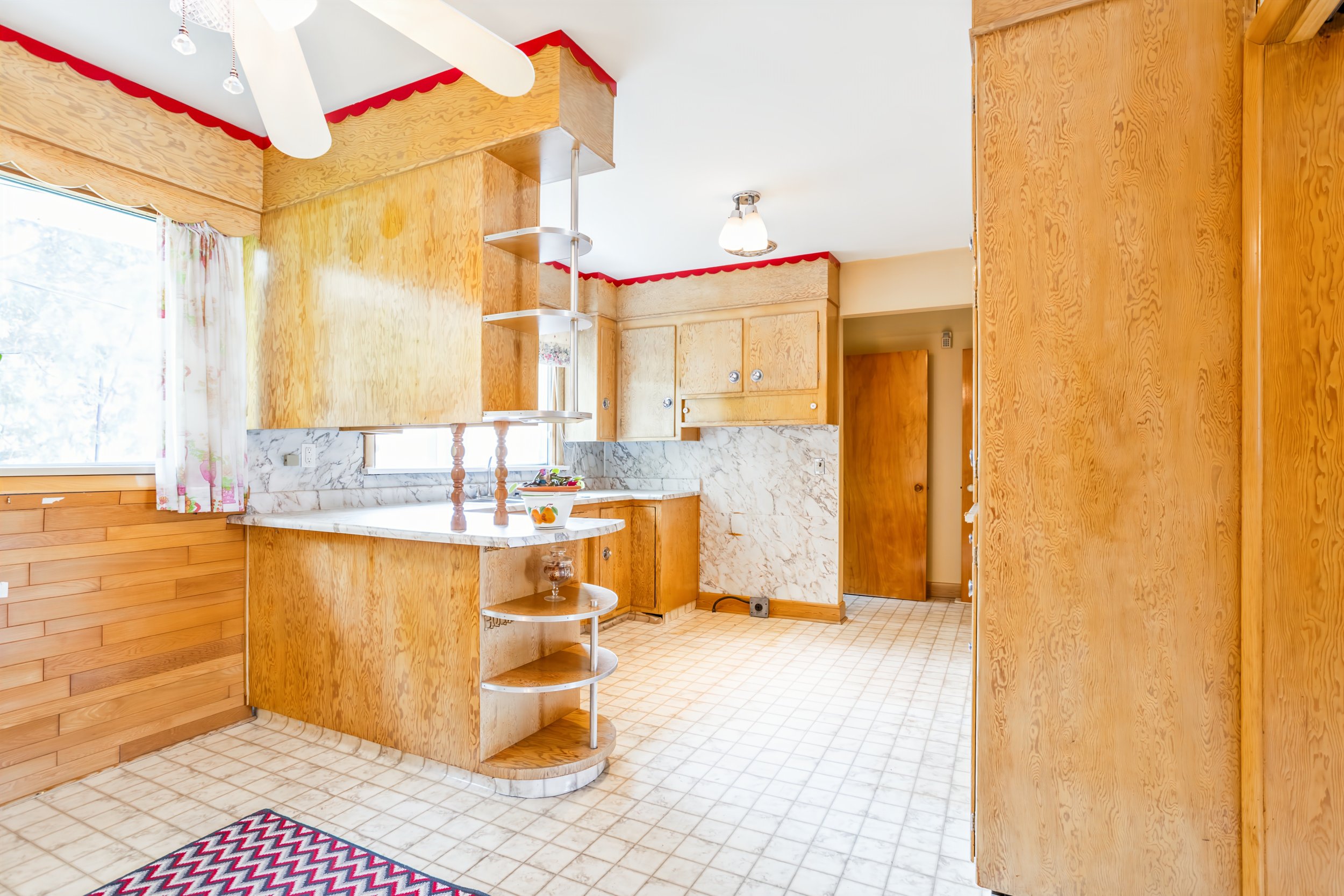 012 Well-maintained original kitchen at 2 Crowson Bay.jpg