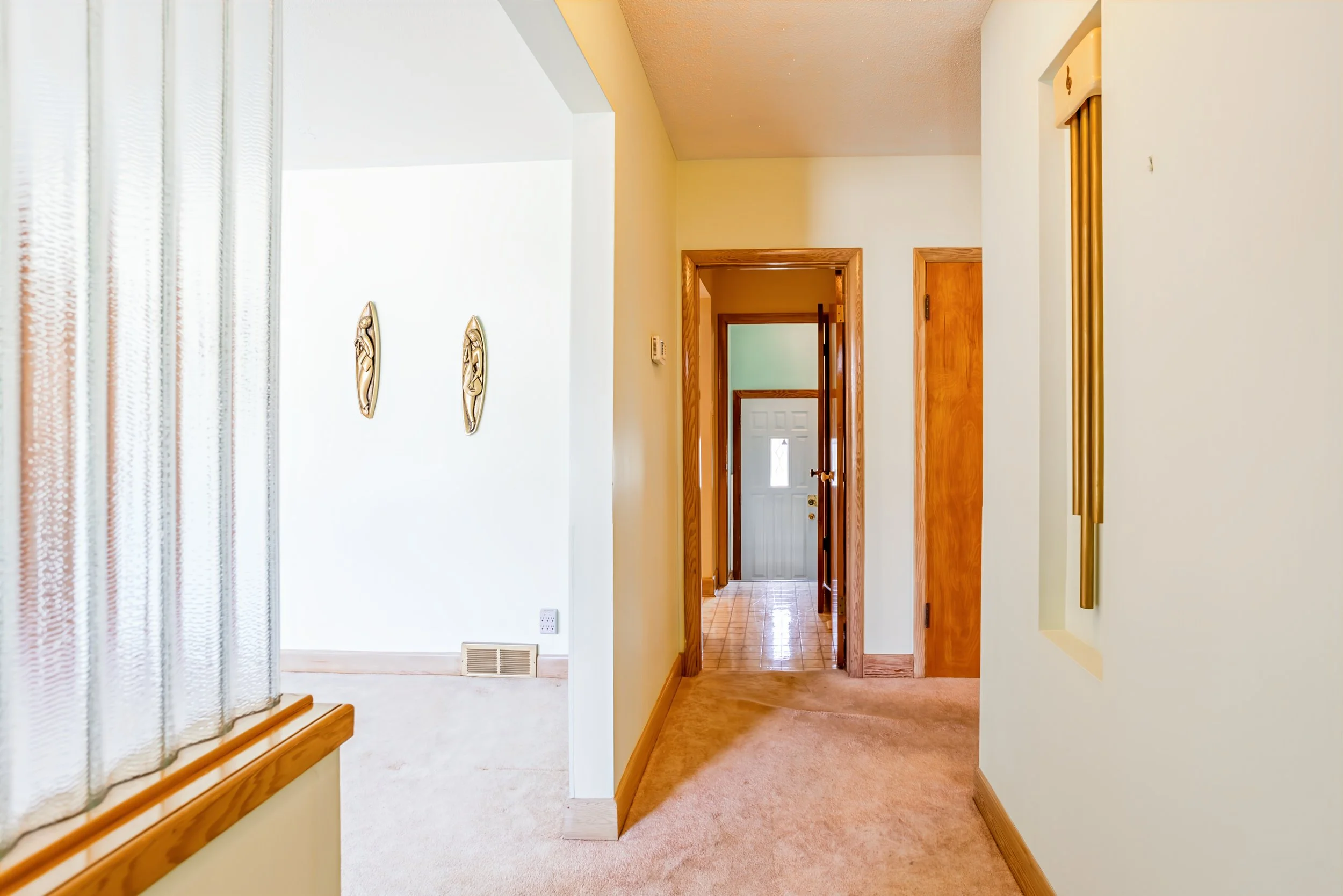 020 welcoming foyer in east fort garry home.jpg