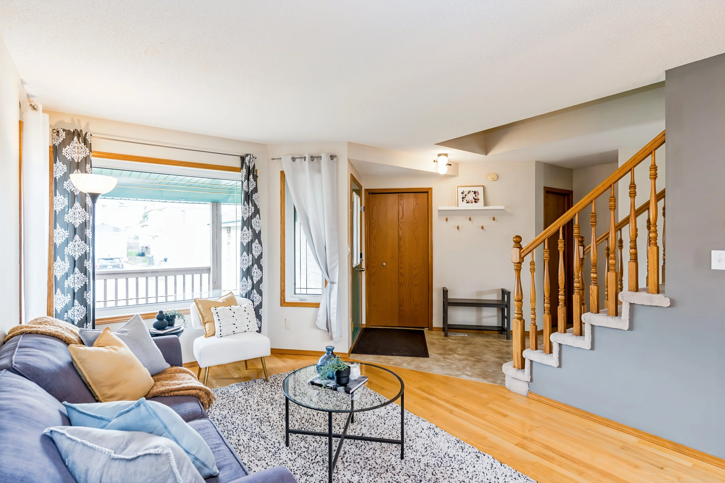 005 Bright front foyer inside Royalwood two-storey home.jpg