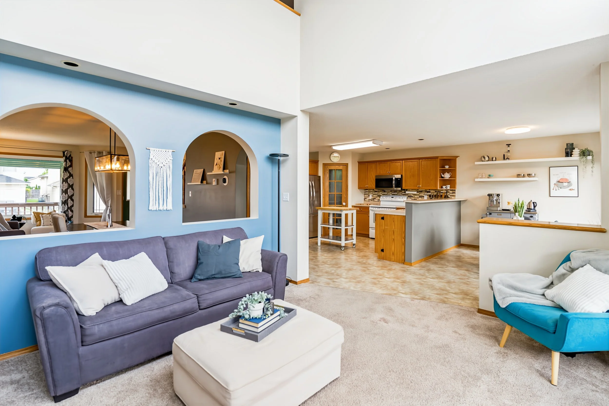 025 Double-height great room filled with natural light.jpg