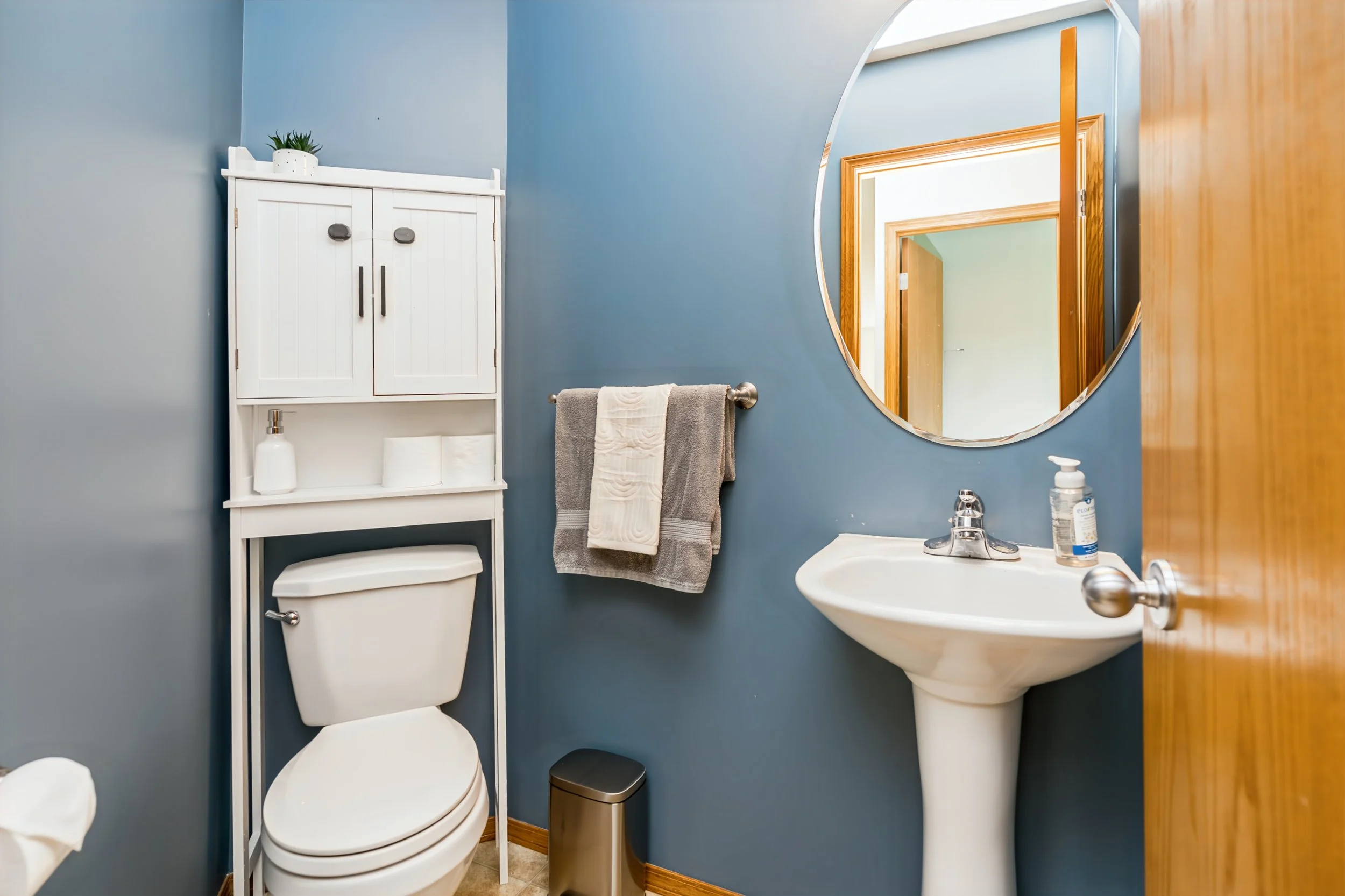 027 Main-floor powder room in Royalwood Listing.jpg