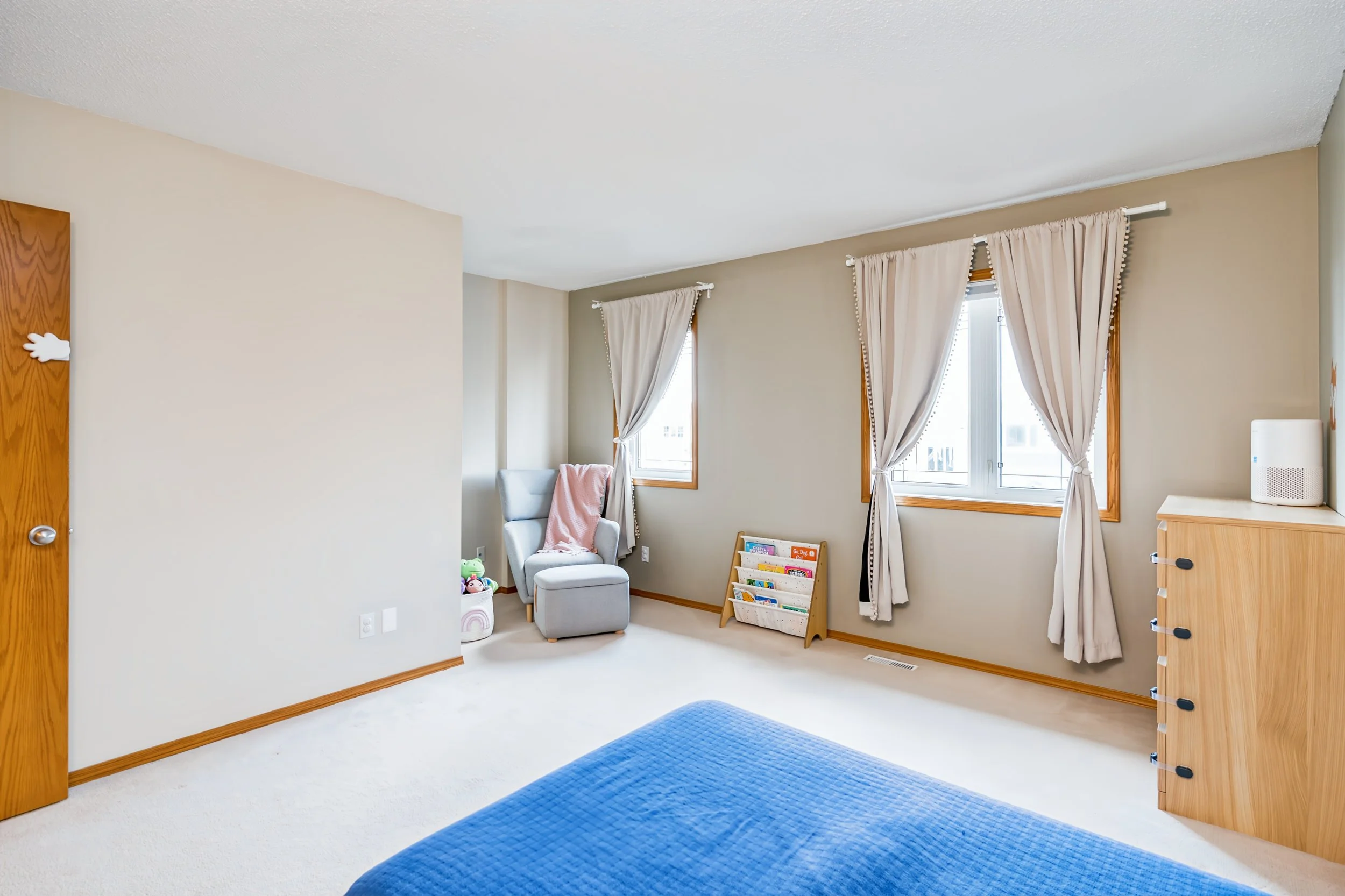 033 Oversized second bedroom in Royalwood family home.jpg