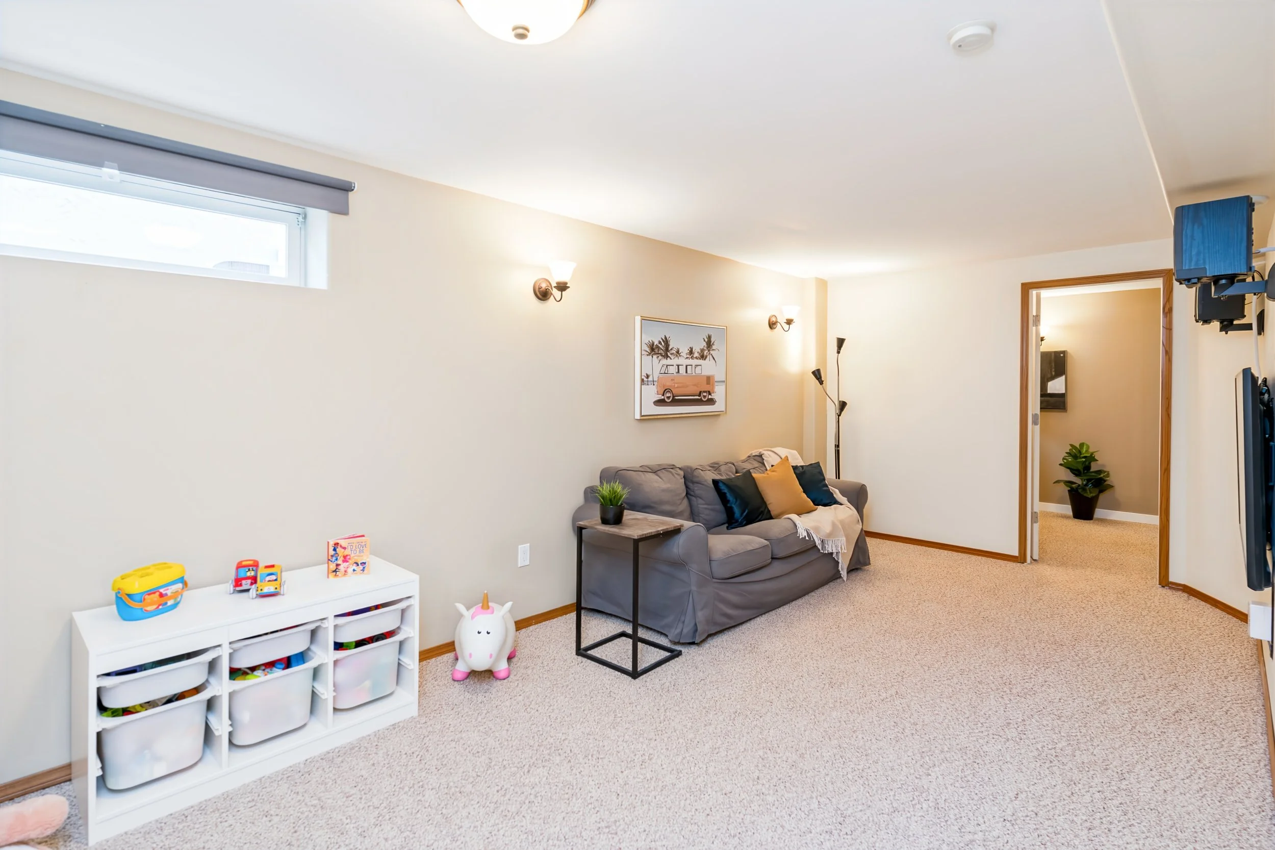 038 Fully finished basement recreation room.jpg
