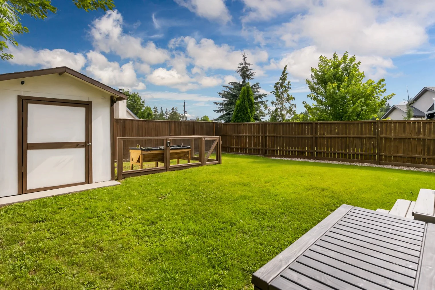 047 Private backyard with included storage shed.jpg