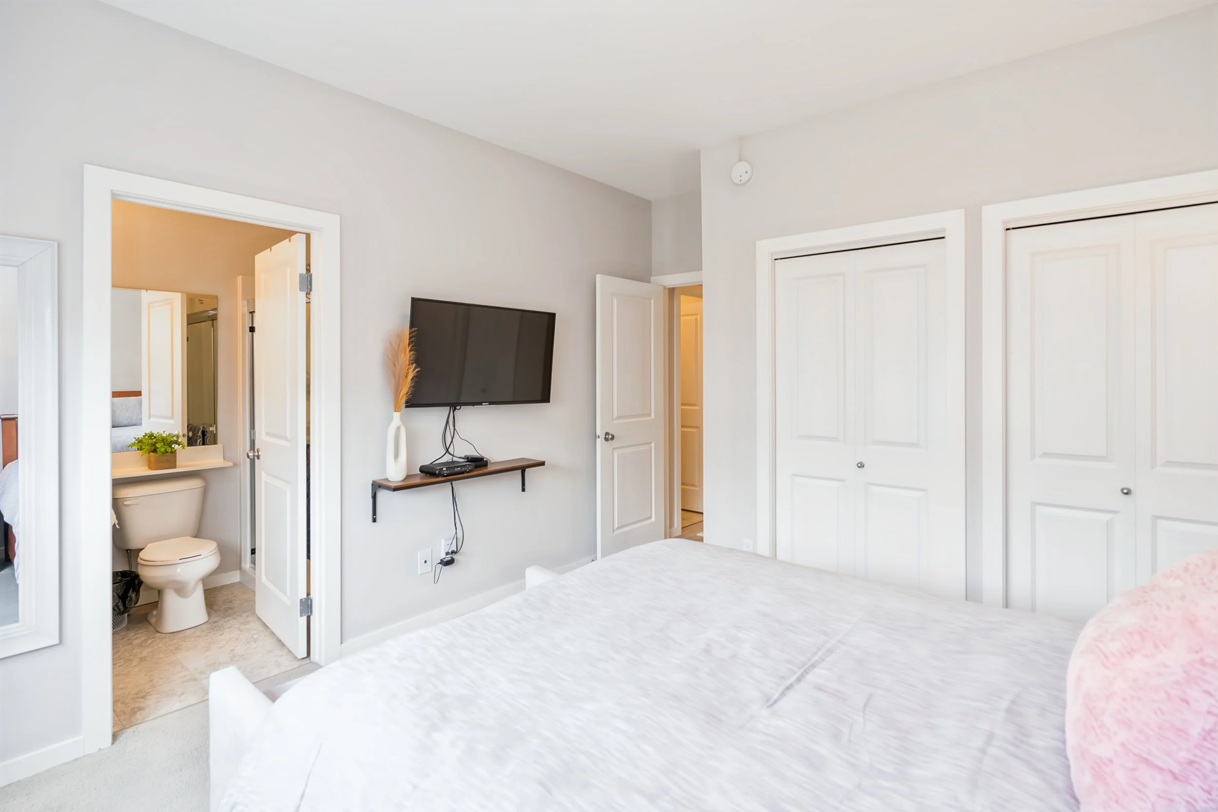 026 Primary bedroom with private ensuite bathroom.jpg