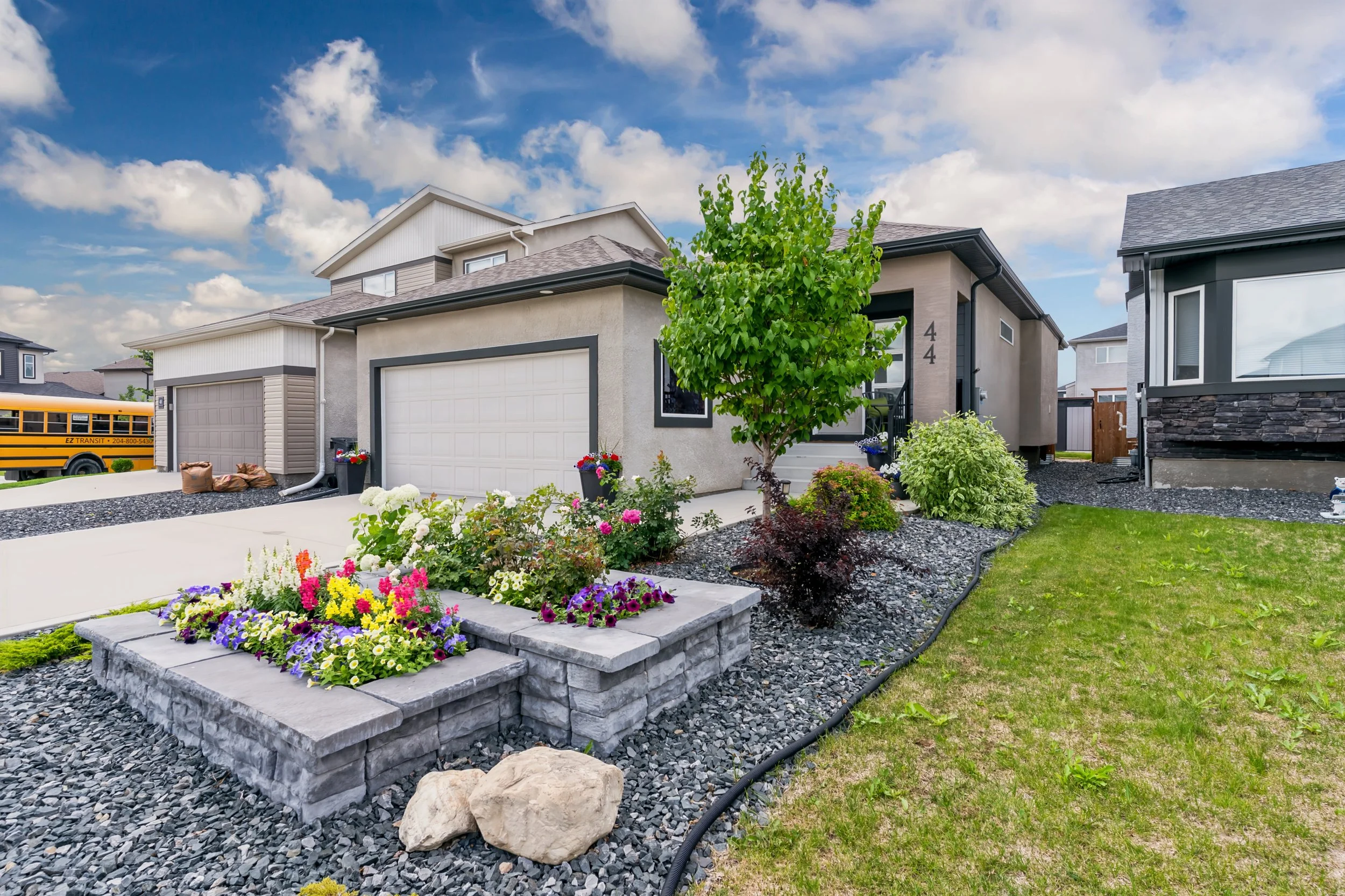 050 Landscaped front yard in Sage Creek Winnipeg.jpg