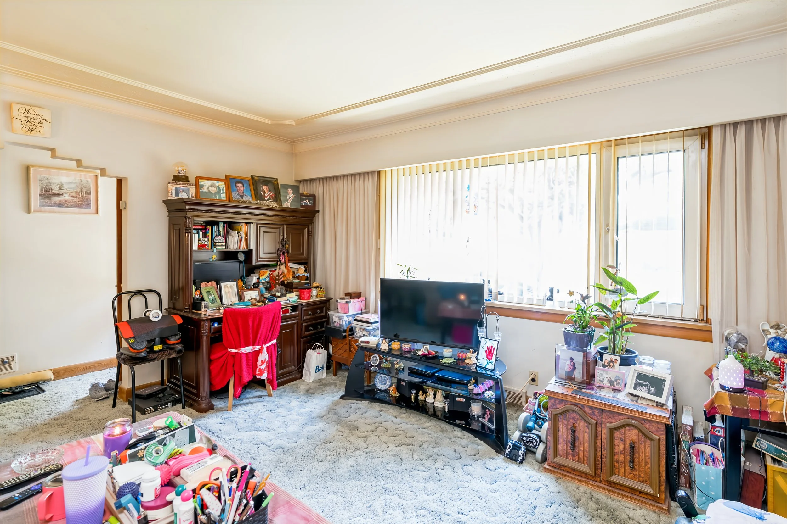 008 Main-floor living area with practical layout and natural light.jpg
