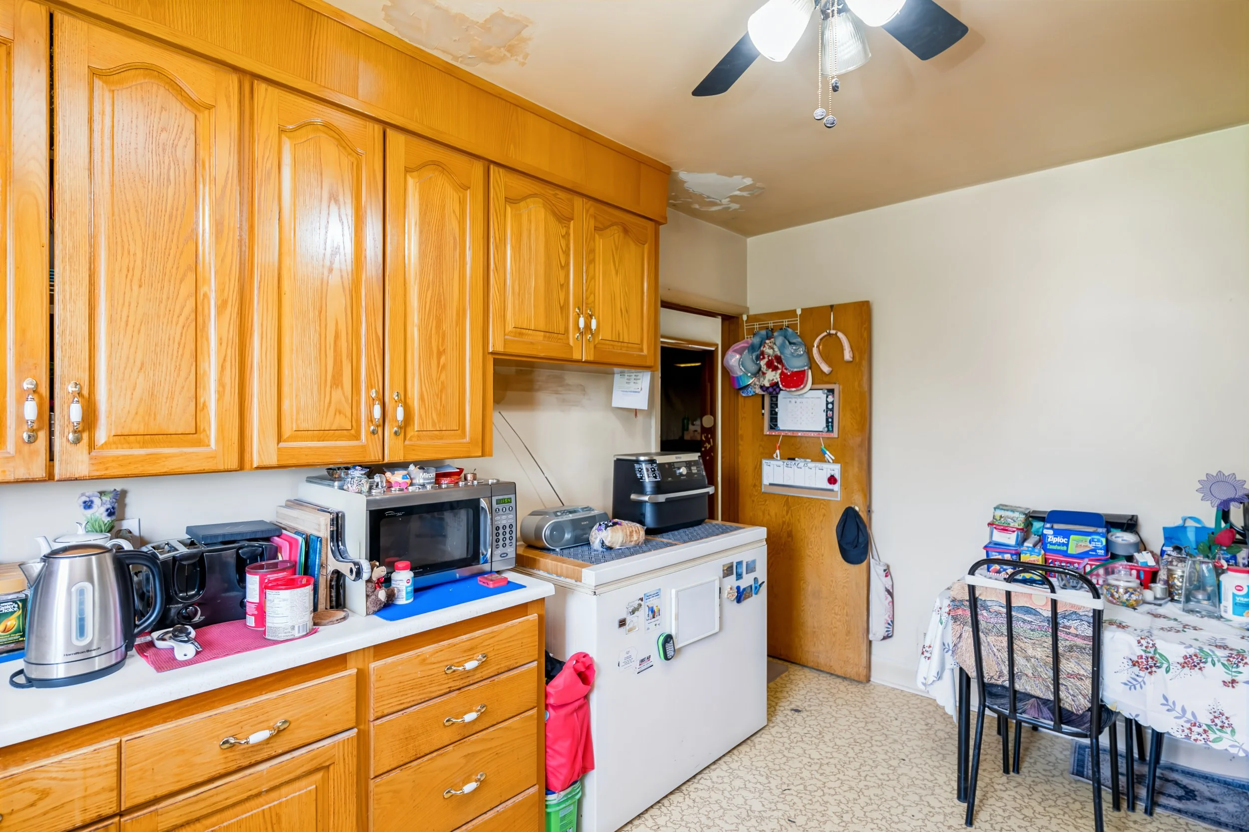 013 Kitchen layout in equity-building Winnipeg real estate opportunity.jpg