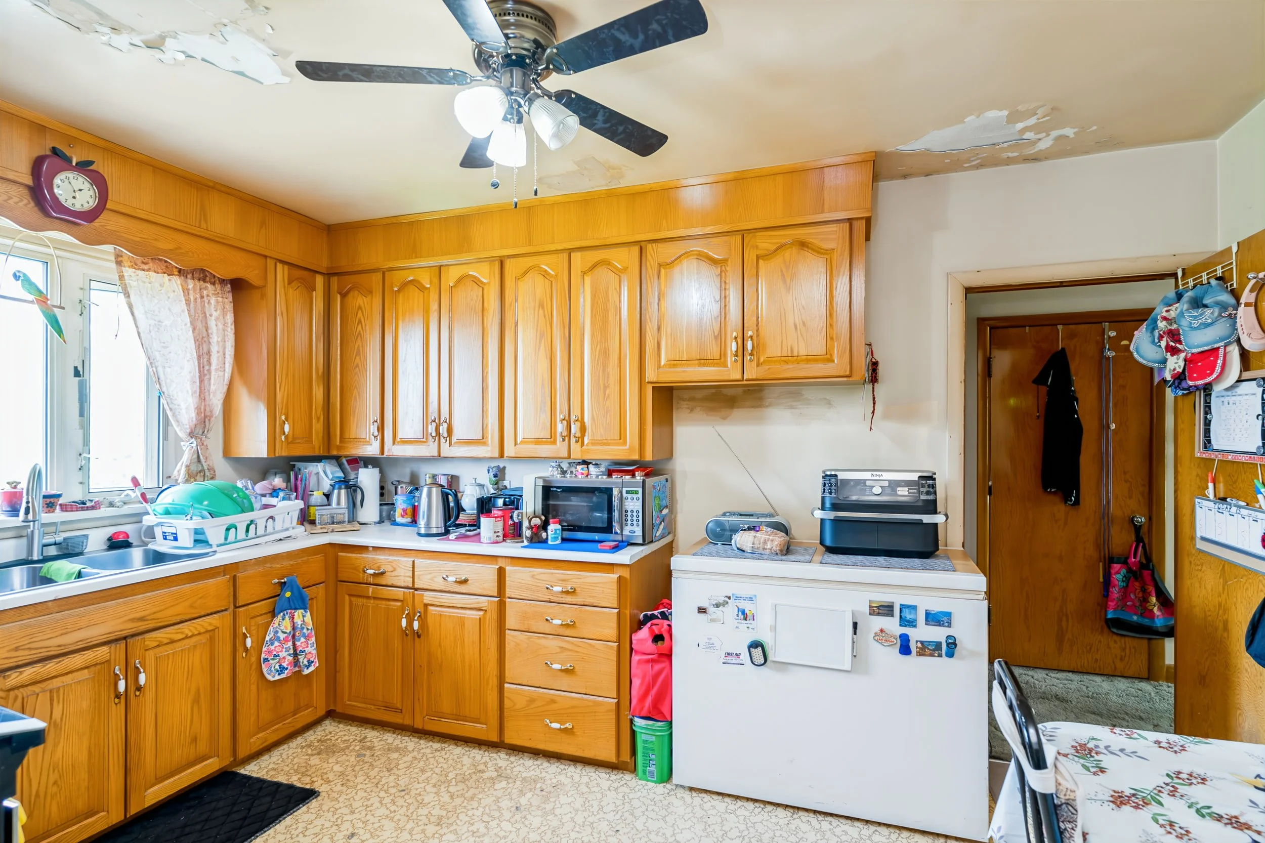014 Kitchen with potential for future cabinetry and finish upgrades.jpg
