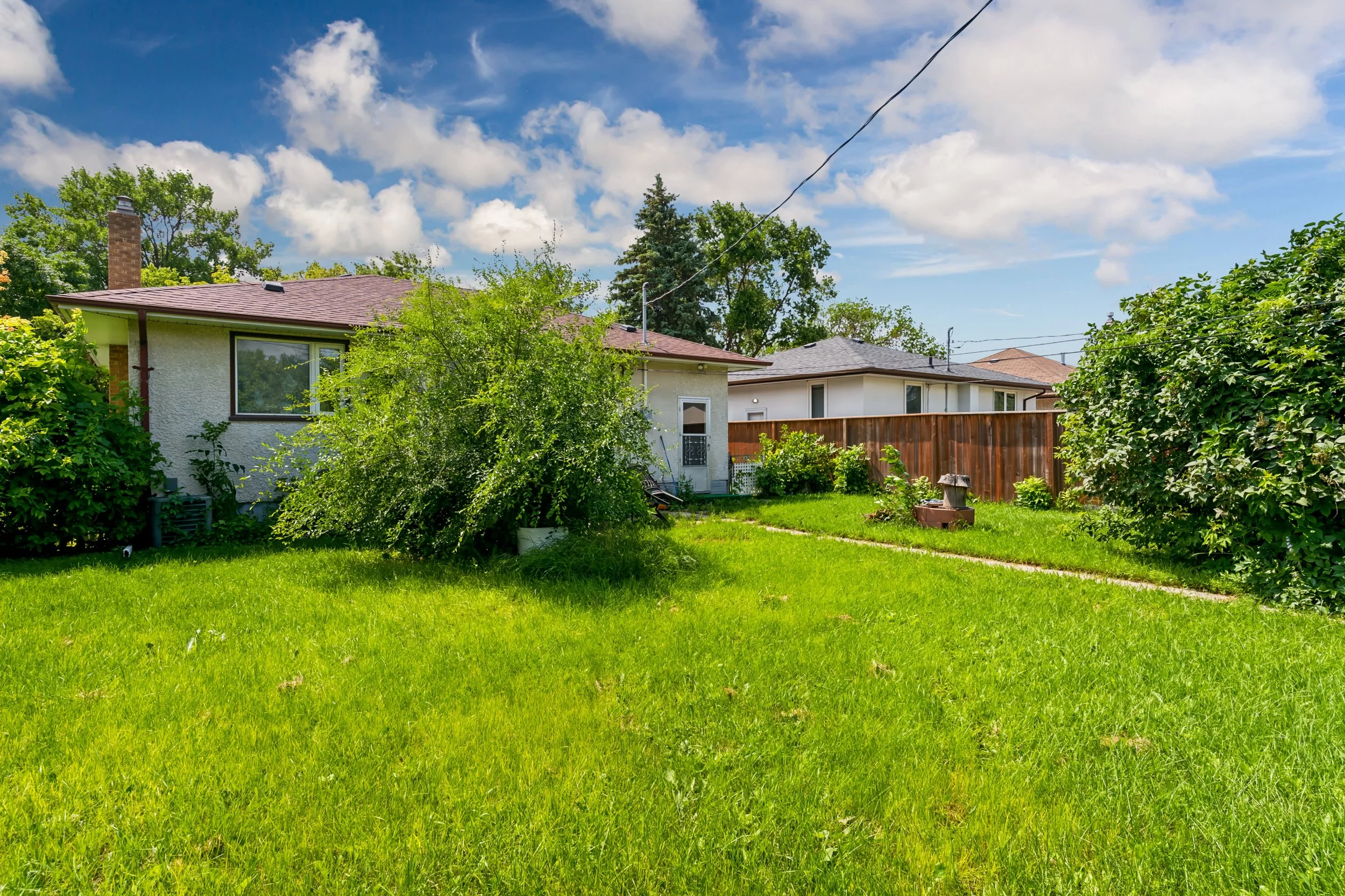 028 Large backyards in sinclair park winnipeg.jpg