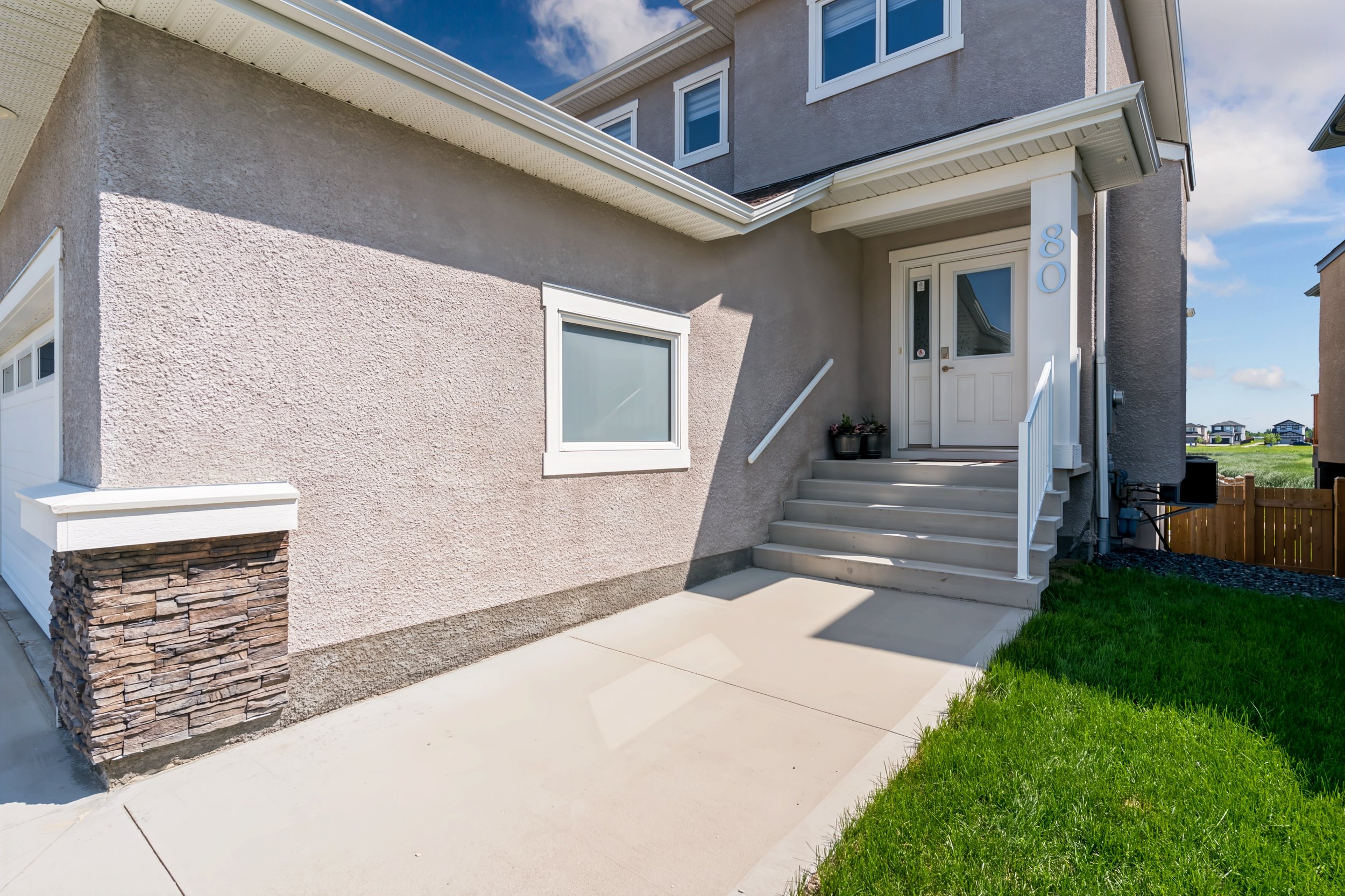 004.1 welcoming front entry into bonavista showhome.jpg