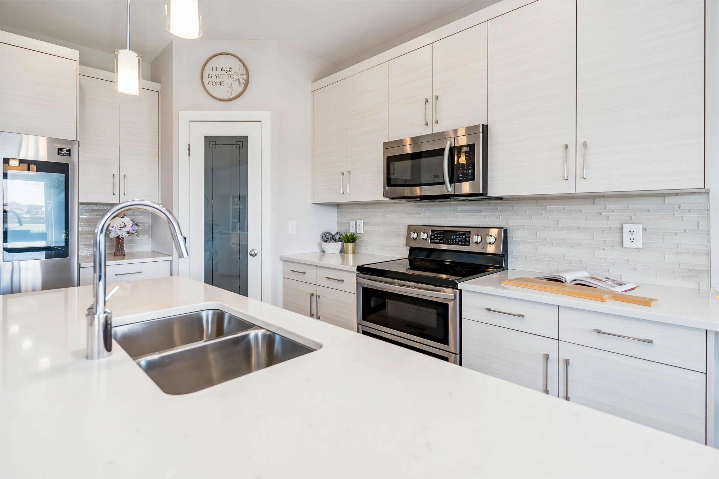 015 Quartz kitchen island and ample workspace.jpg