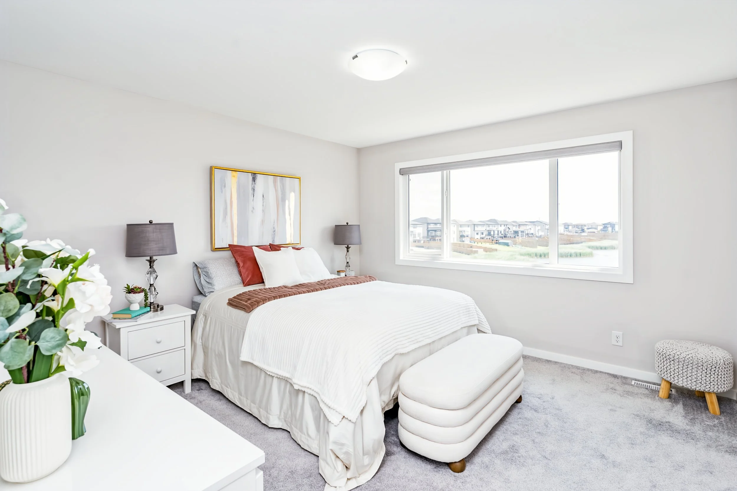 026 Spacious primary bedroom with lake views.jpg