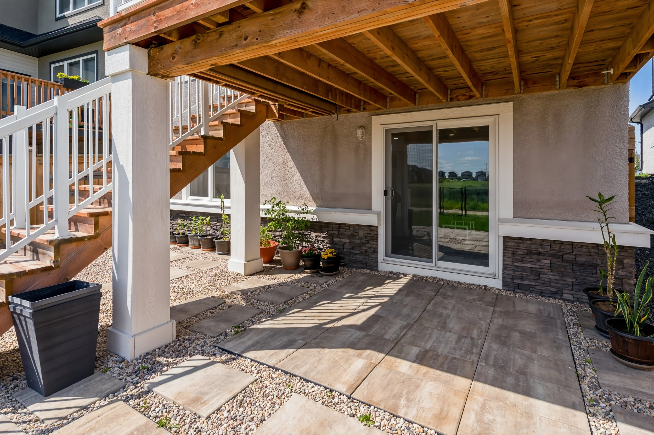 043 walkout doors leading to backyard patio bonavista.jpg
