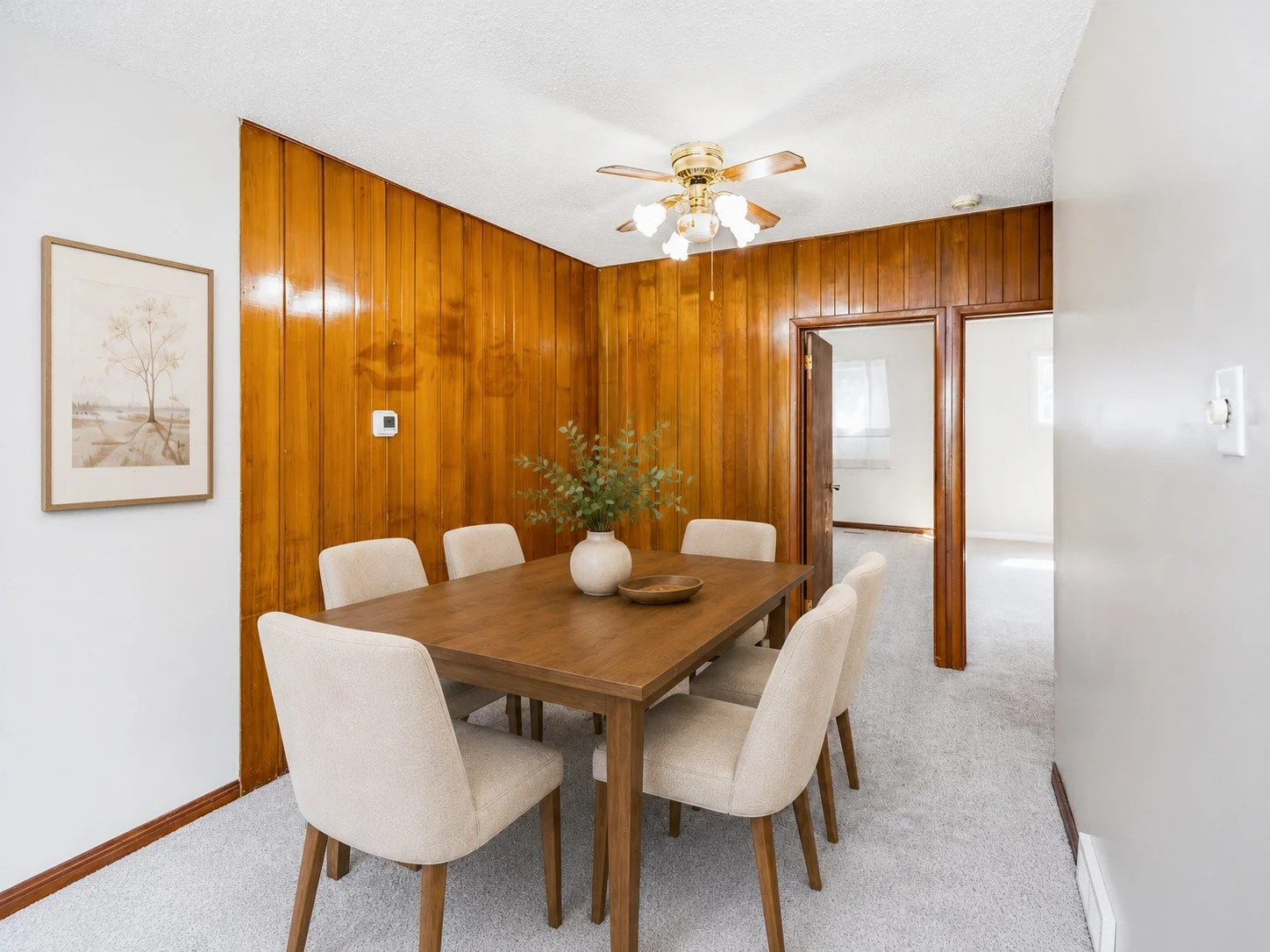 010 Main-floor dining area in Winnipeg bungalow.jpg