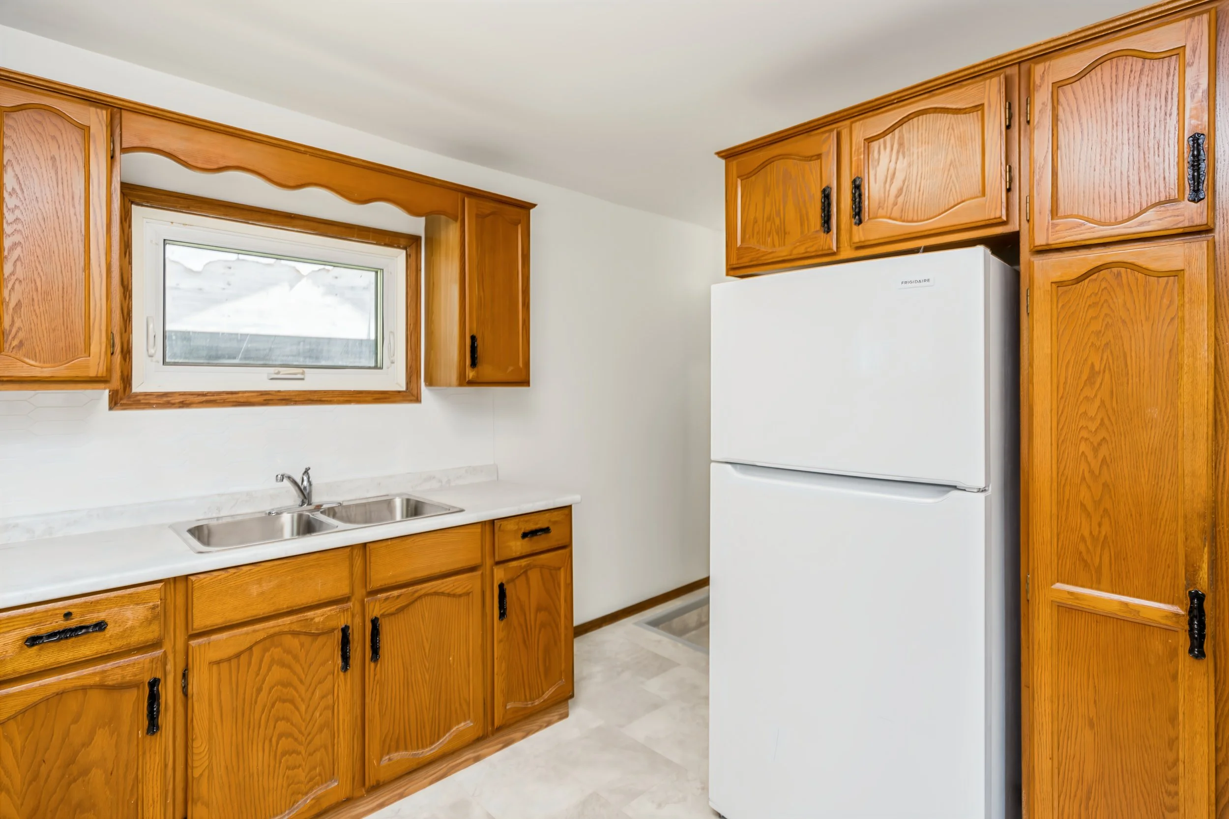 016 Functional main-floor kitchen with generous workspace.jpg