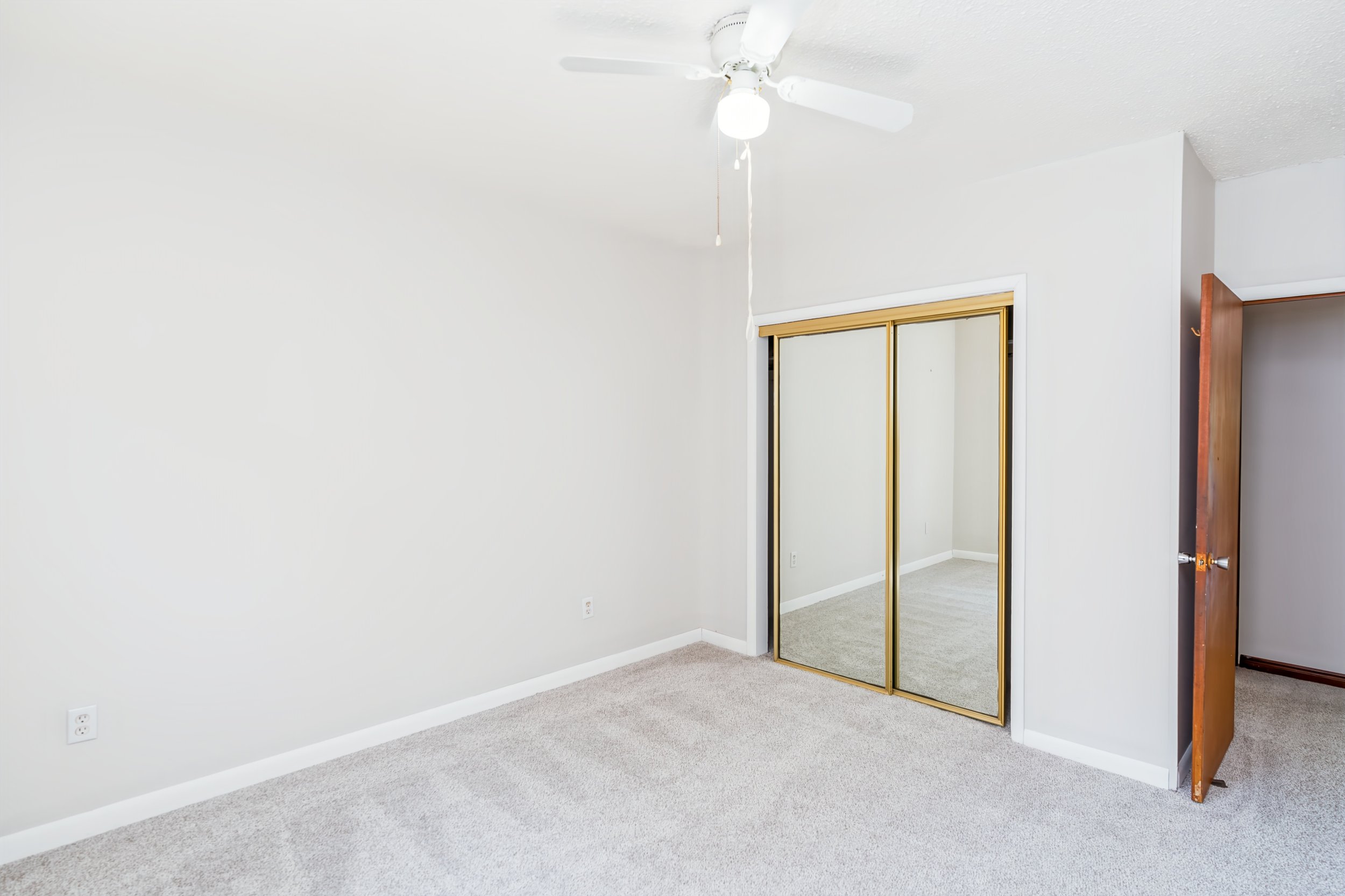 020 Main-floor primary bedroom in Winnipeg bungalow.jpg