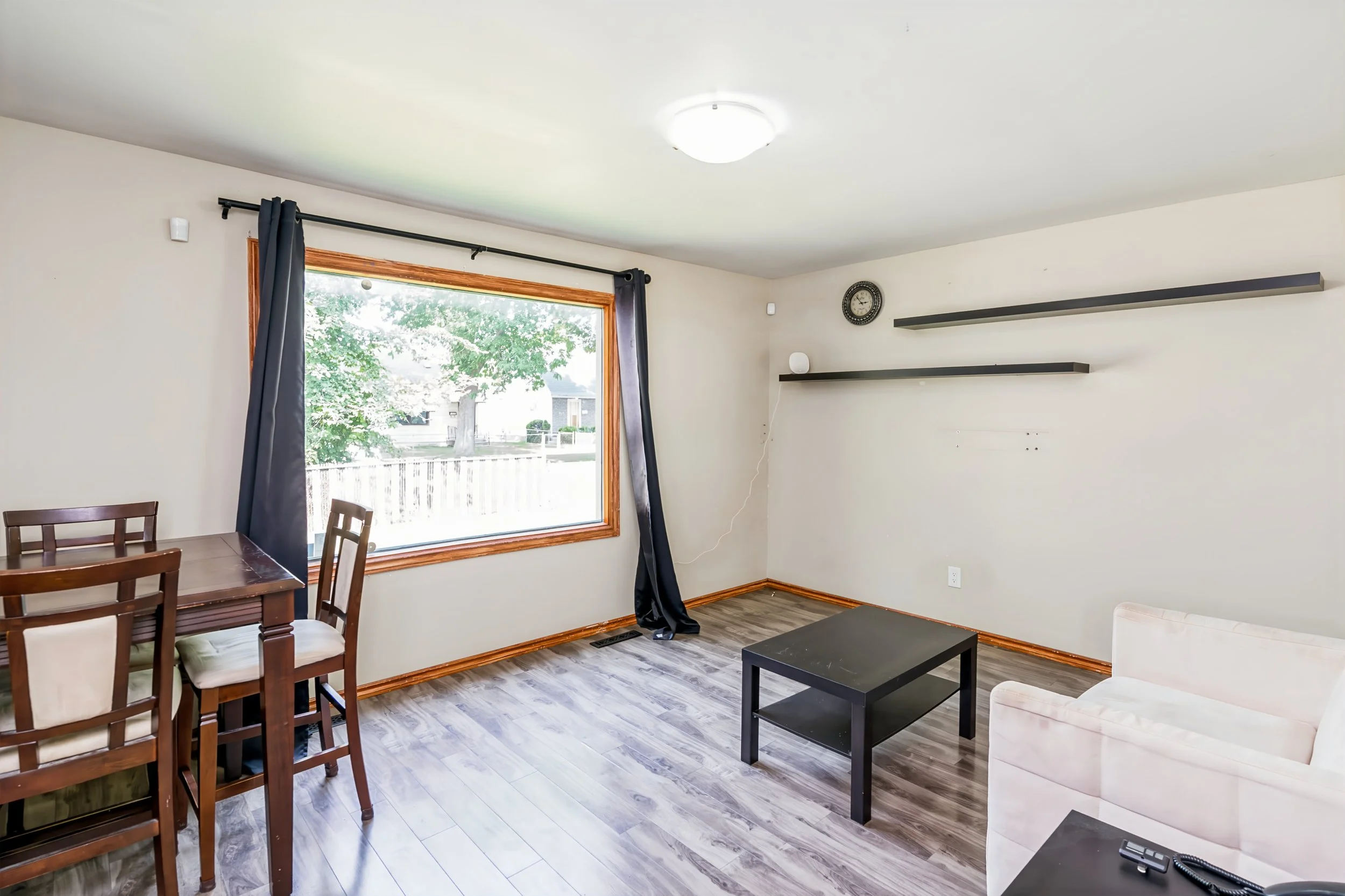 004 Living room with open connection to dining area.jpg