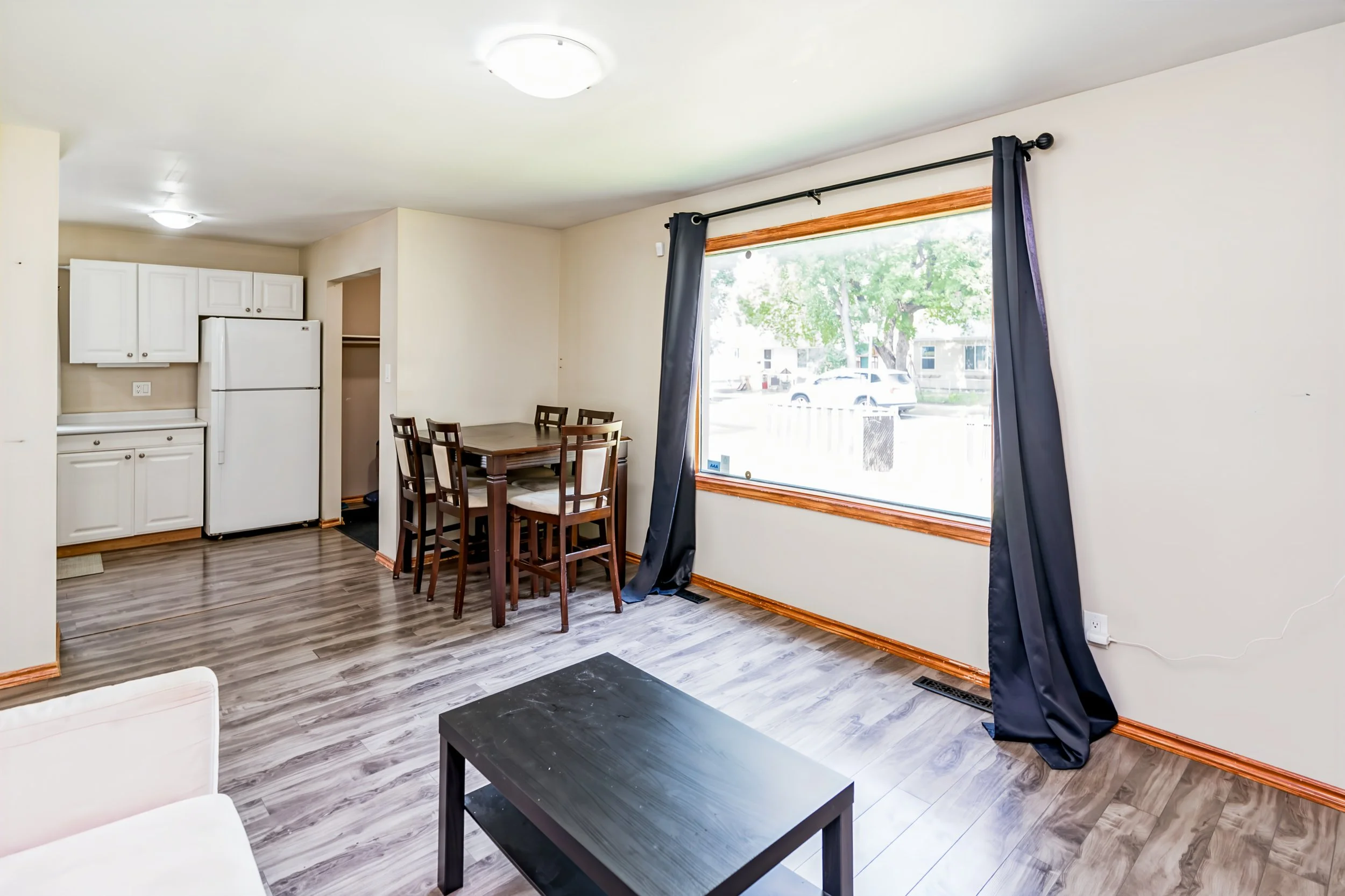005 Main living space in three-bedroom Winnipeg house.jpg