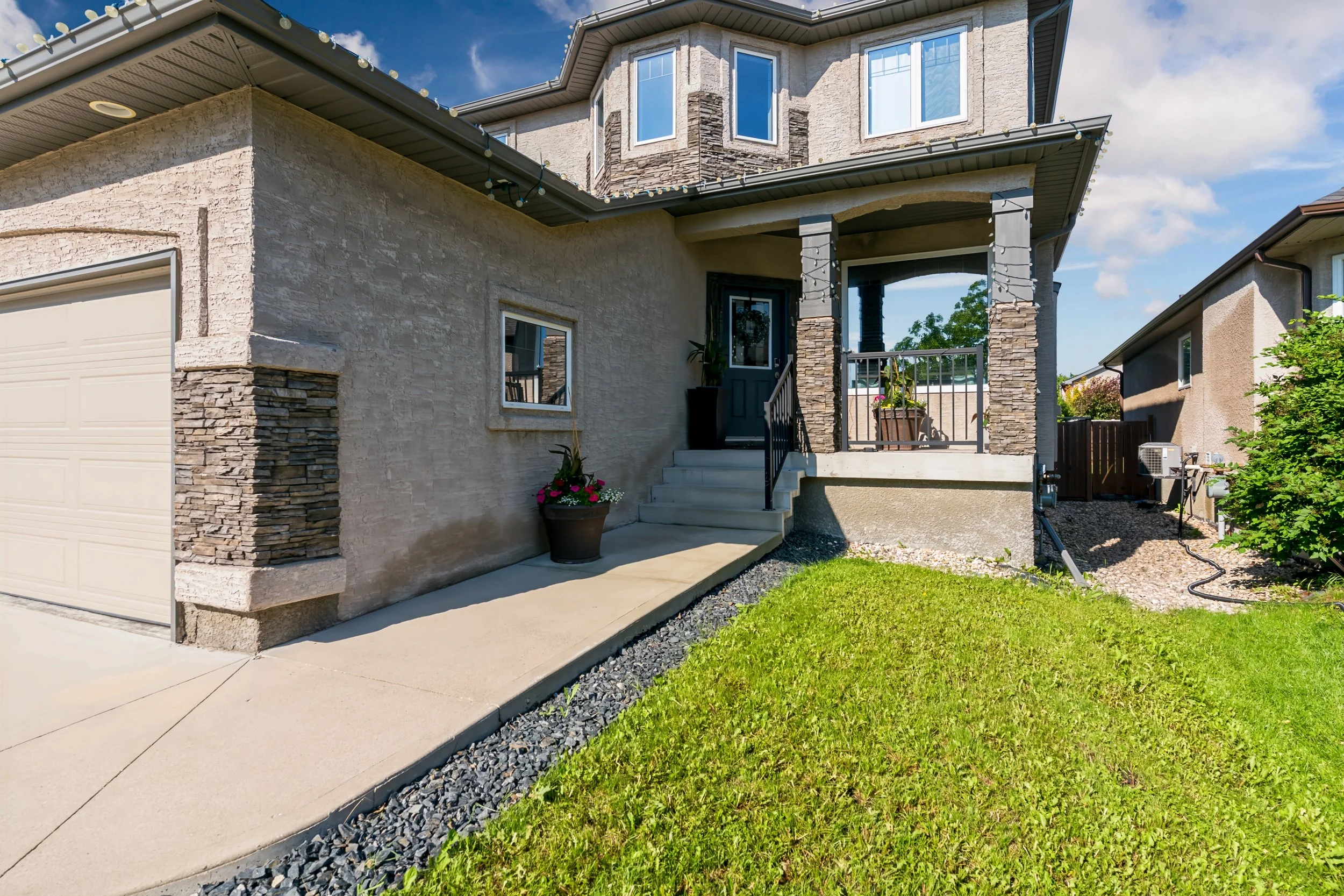 048 front porch of transcona family home.jpg