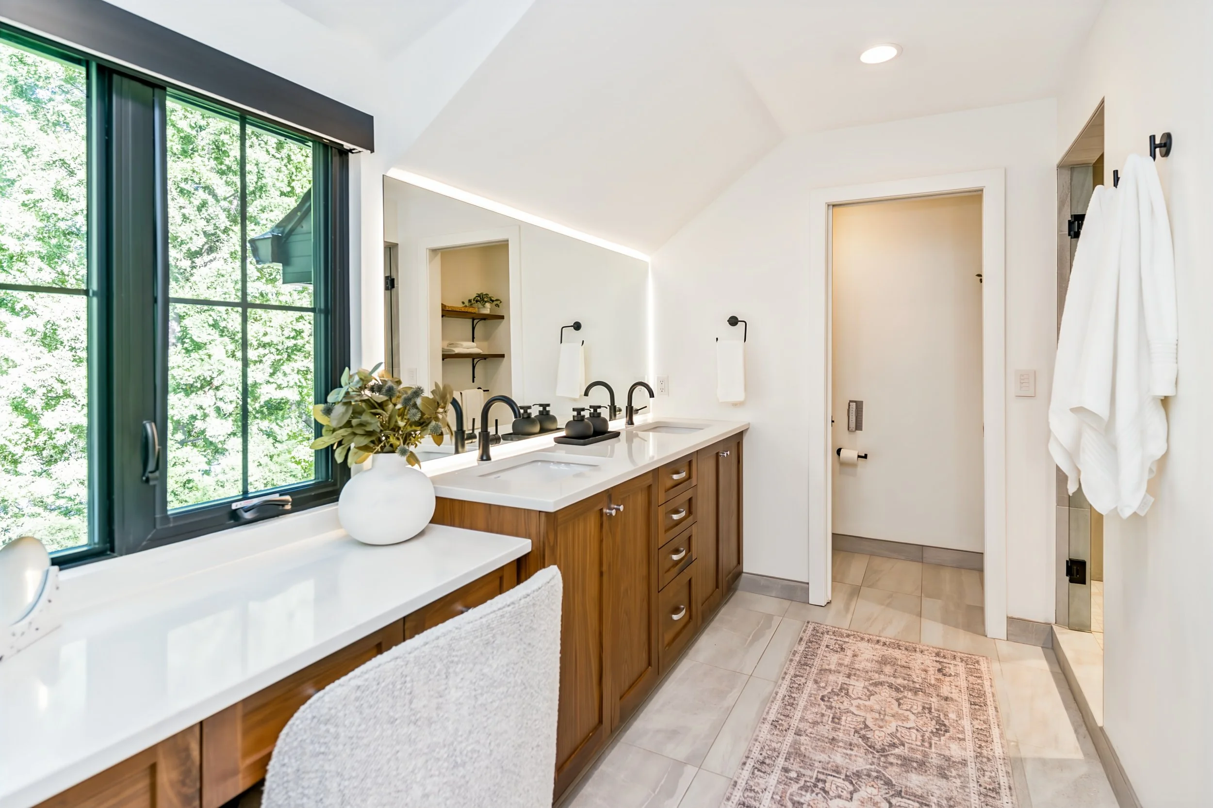 053 Luxury primary ensuite with heated tile floors.jpg