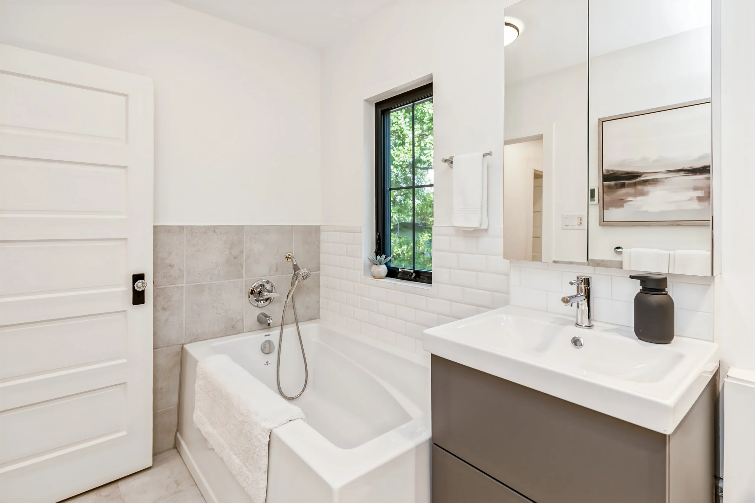 065 luxury bathroom with deep soaker tub.jpg