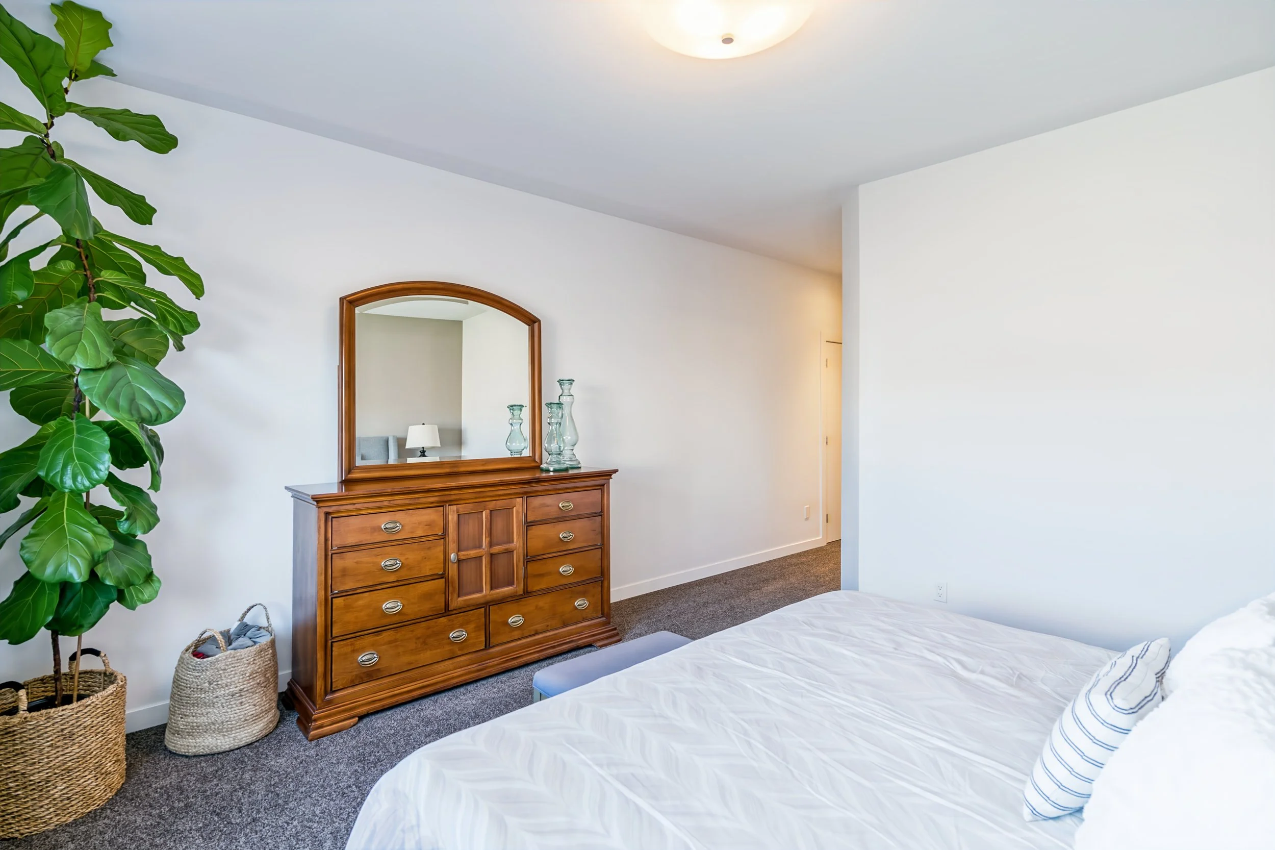 021 Artista bungalow primary bedroom in Winnipeg.jpg