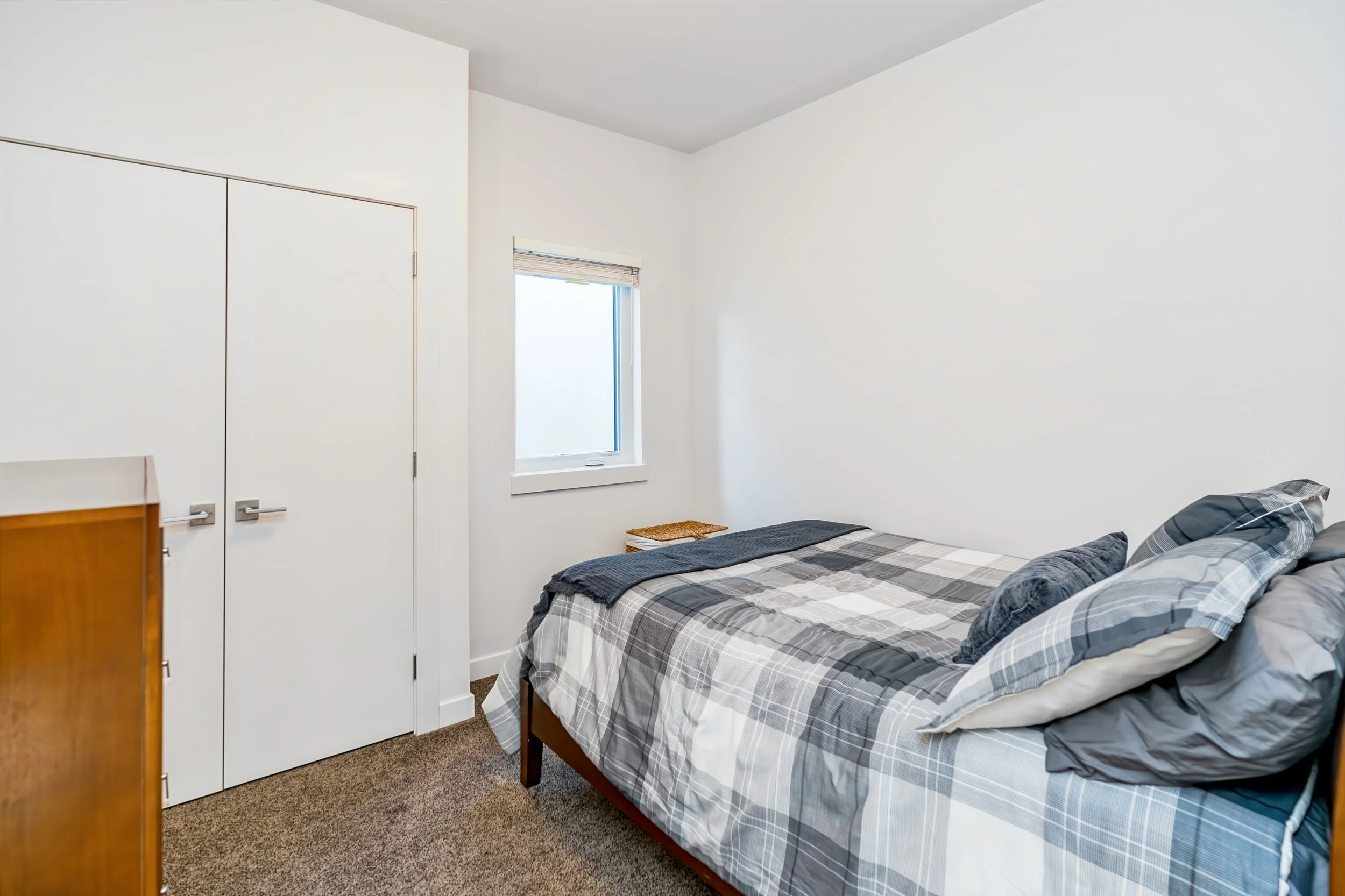 026 Main-floor bedroom in River Park South bungalow.jpg