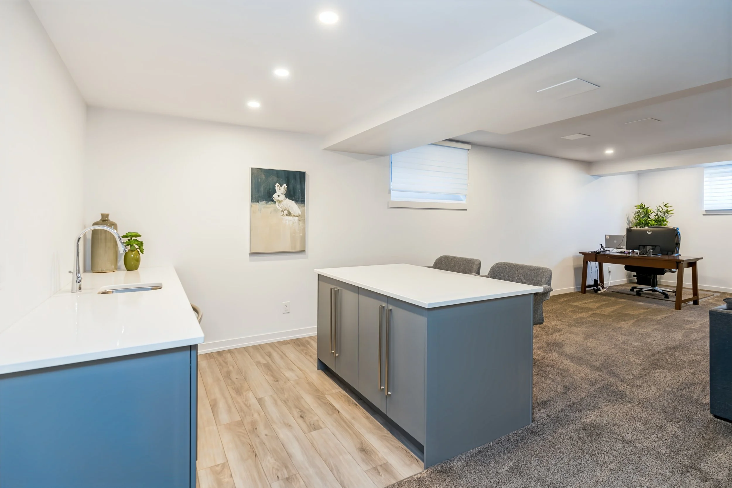 033 Finished basement with wet bar in Winnipeg home.jpg