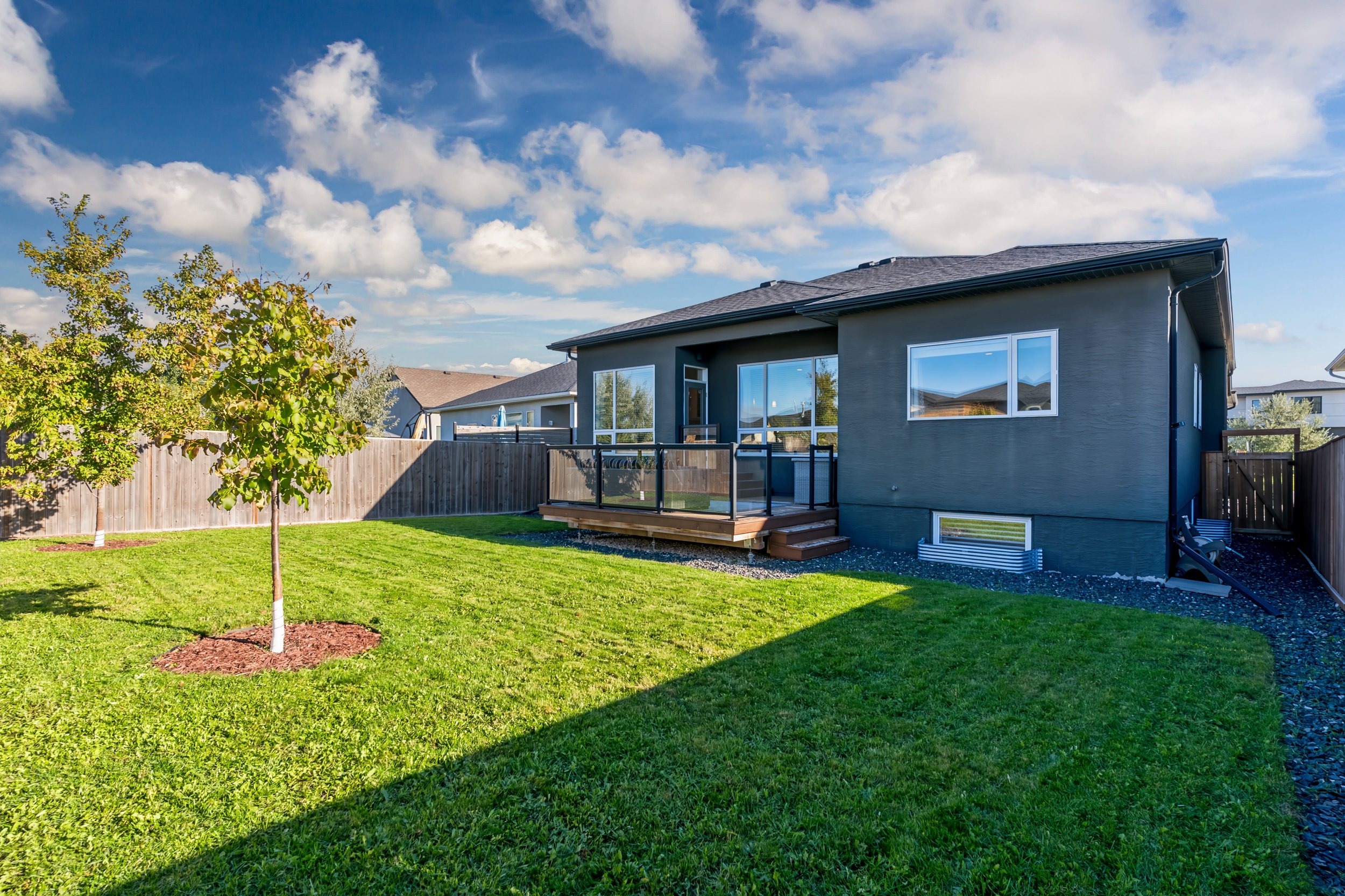 049 Landscaped backyard in River Park South Winnipeg.jpg