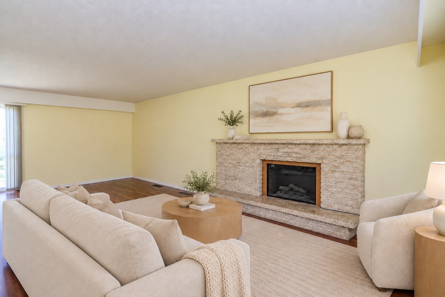 Ivory living room with blanket on arm.jpeg