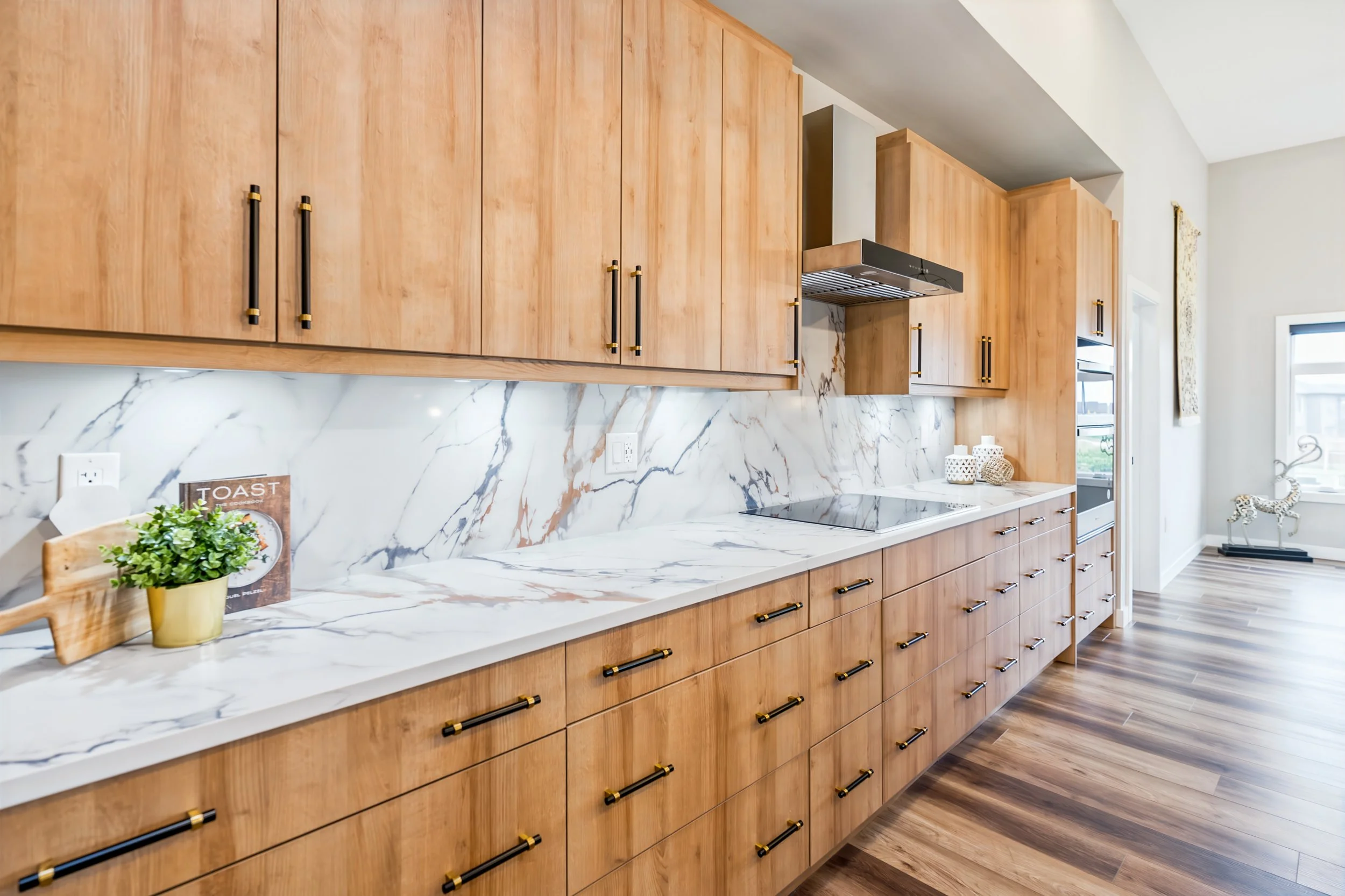 017 Kitchen view showing the island and adjoining living space..jpg