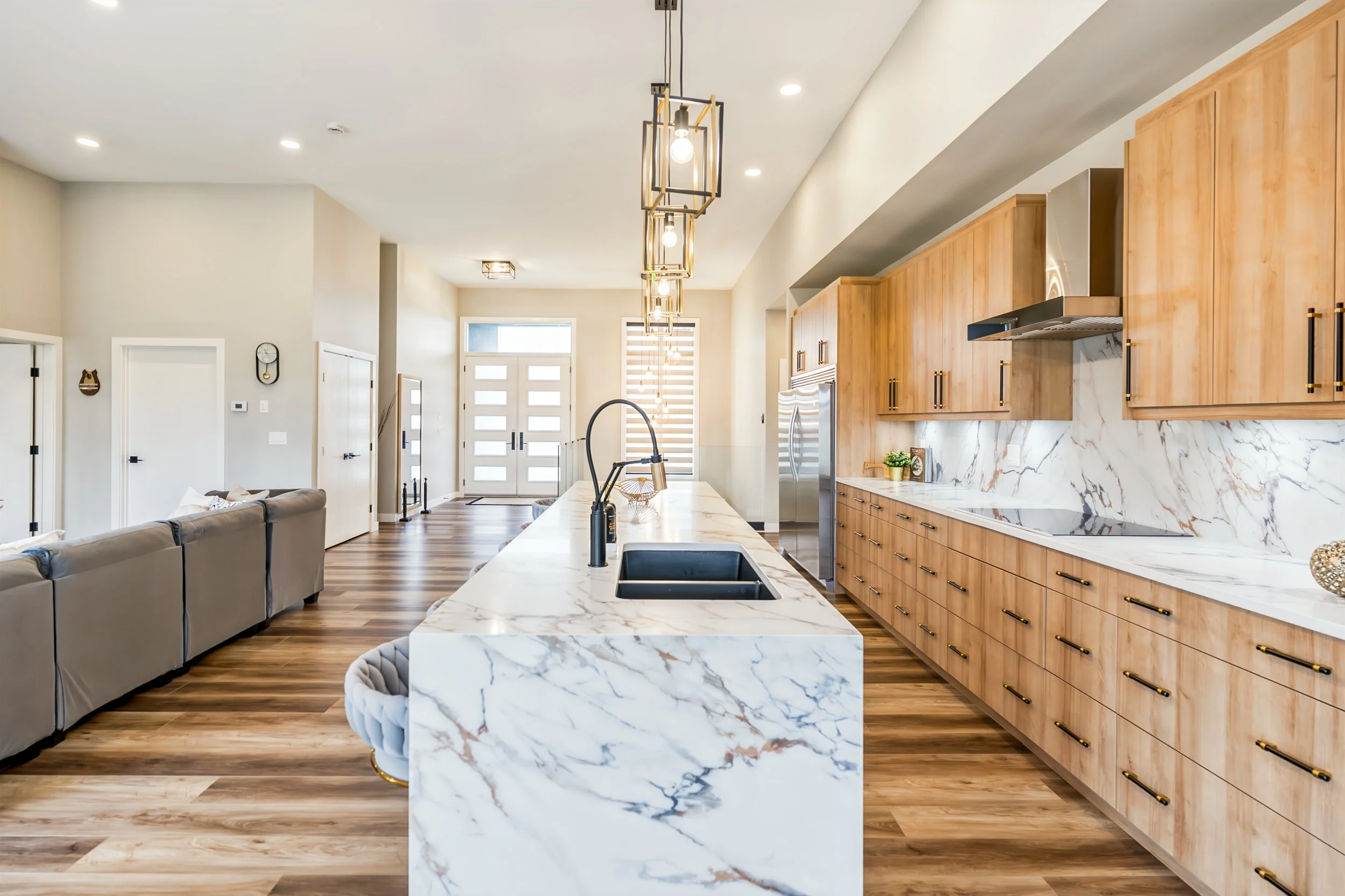 025 Homes with waterfall kitchen islands.jpg