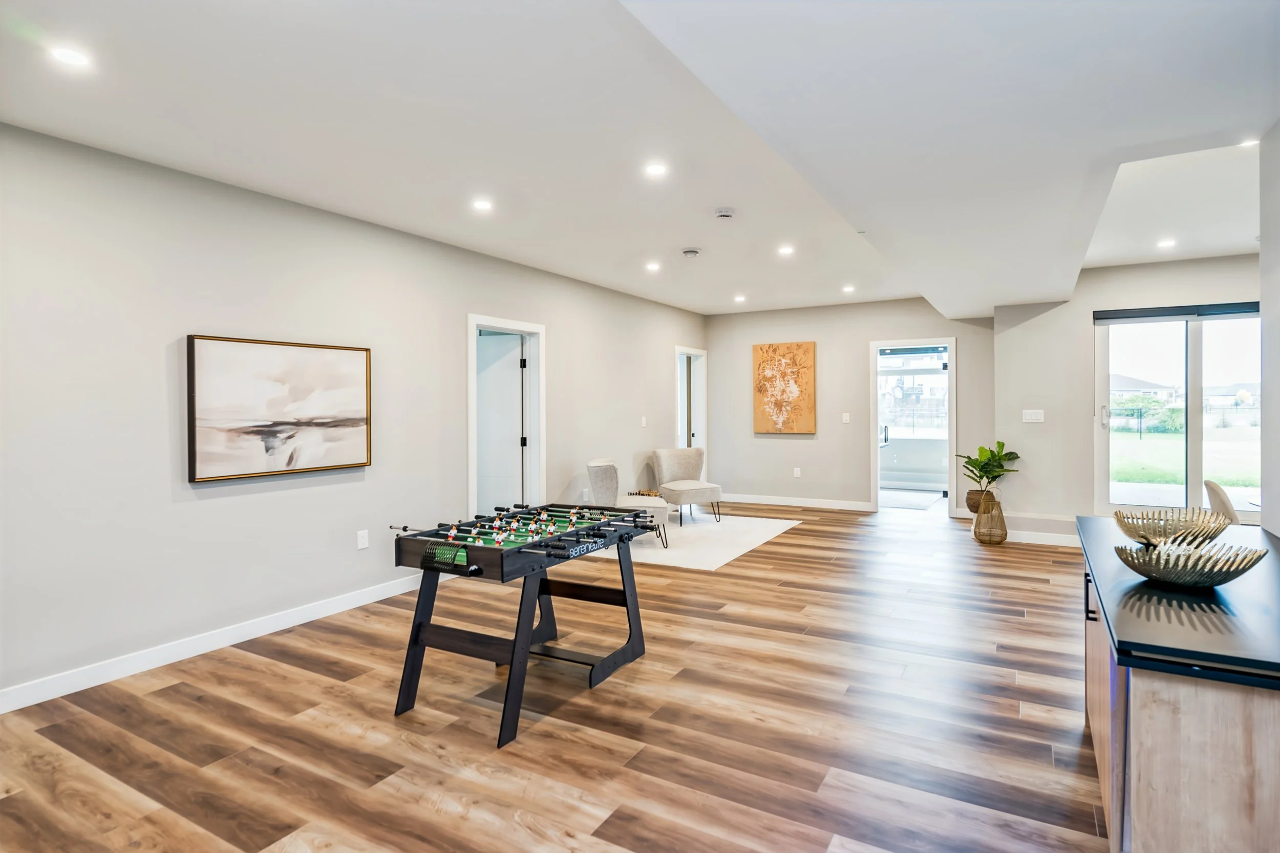 053 Lower-level living space showing the bright walkout design..jpg